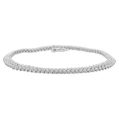 Pulsera de tenis de tres filas de diamantes en oro blanco de 10 quilates