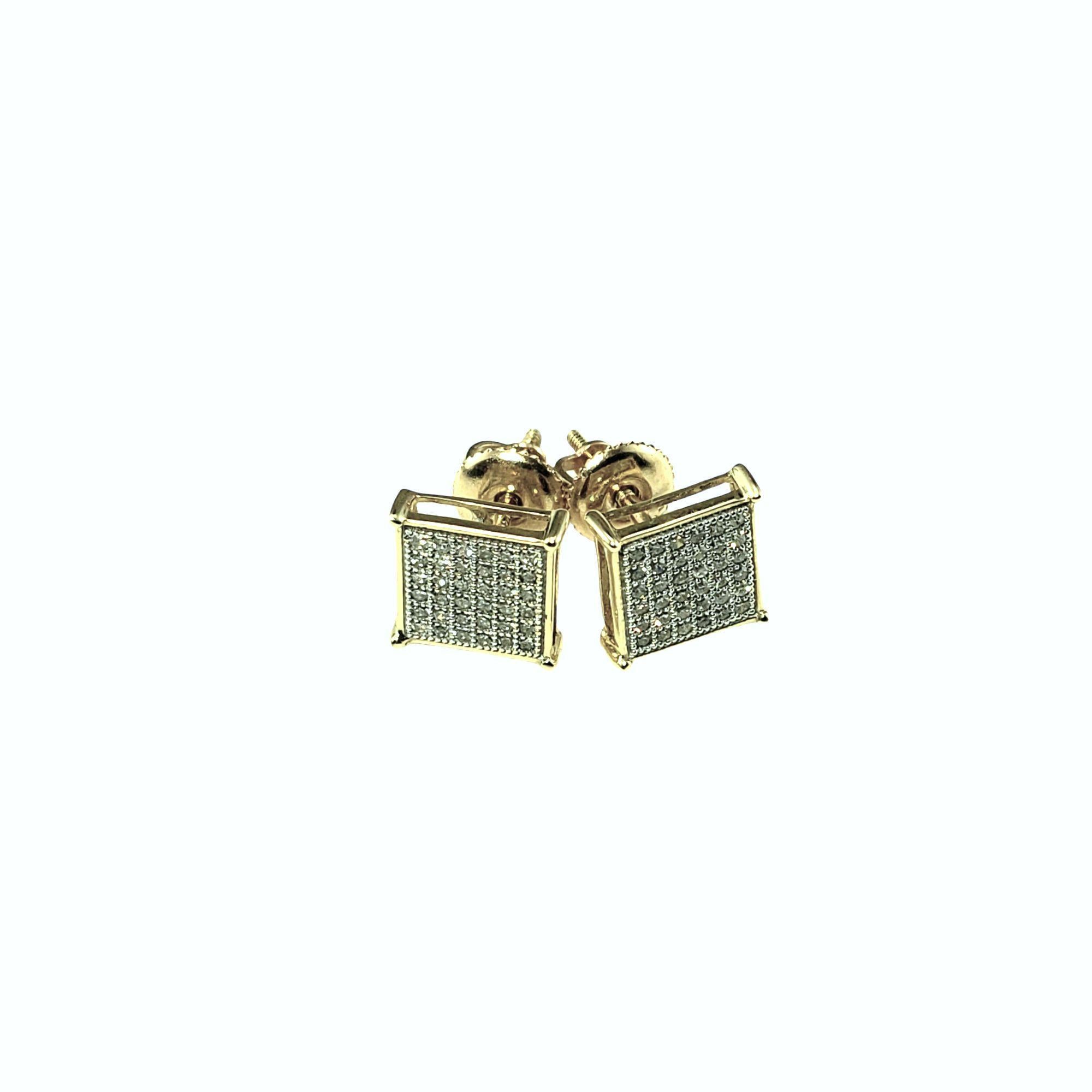 10 Karat Yellow Gold and Diamond Earrings-

These sparkling stud earrings each feature 36 round single cut diamonds set in classic 10K gold. Screw back closures.

Approximate total diamond weight: .24 ct.

Diamond clarity: SI1-I1

Diamond color: