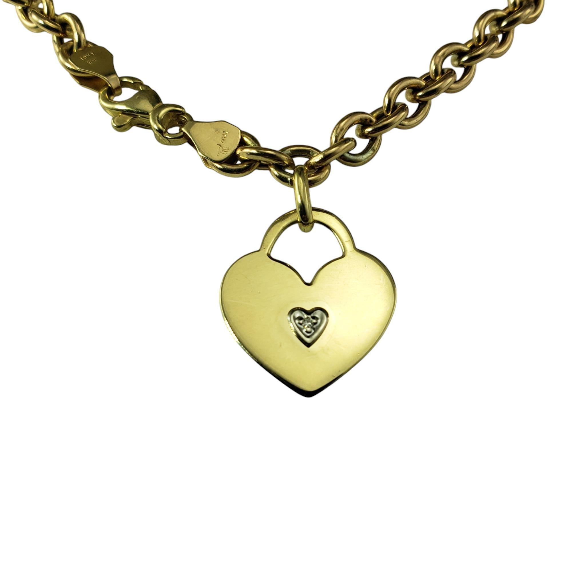 10 Karat Yellow Gold and Diamond Link Bracelet with Heart Tag-

This timeless link bracelet features a dangling heart tag accented with one round single cut diamond, adding a touch of sparkle to this classic piece. Crafted in classic 10K yellow