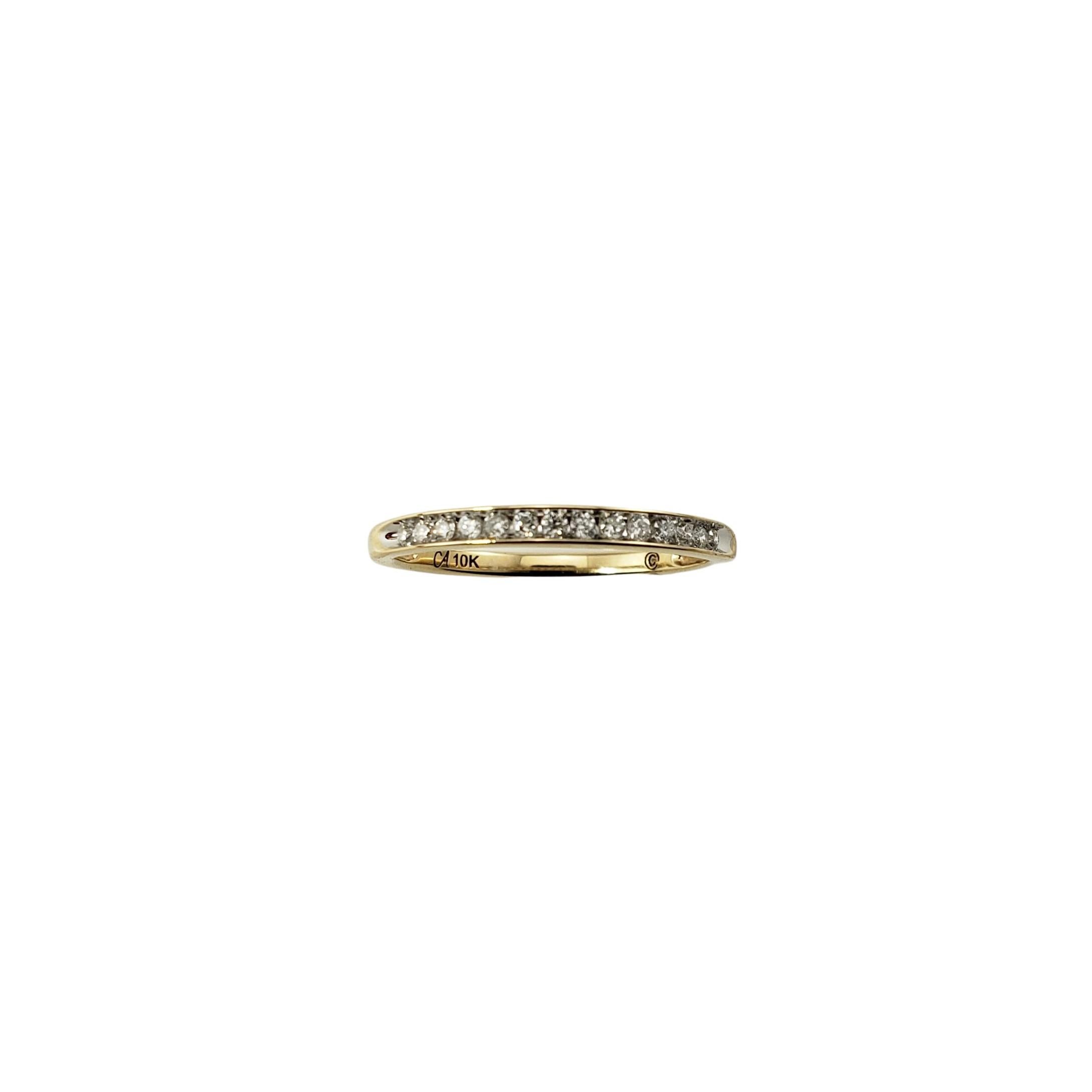 10 Karat Yellow Gold and Diamond Wedding Band Ring Size 7.25-

This elegant band features 14 round brilliant cut diamonds set in classic 10K yellow gold.  Width:  2 mm.

Approximate total diamond weight:  .14 ct.

Diamond color: H-I

Diamond