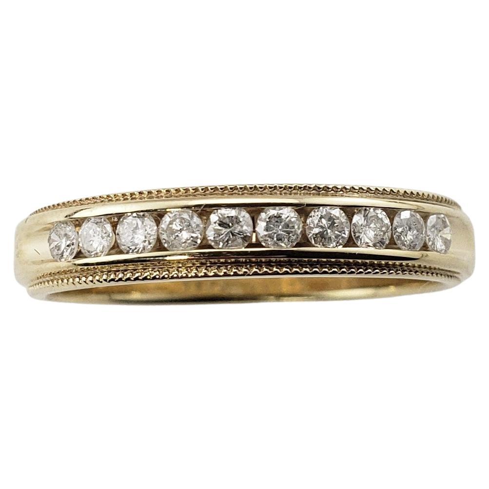 10 Karat Yellow Gold and Diamond Wedding Band Ring Size 7.5