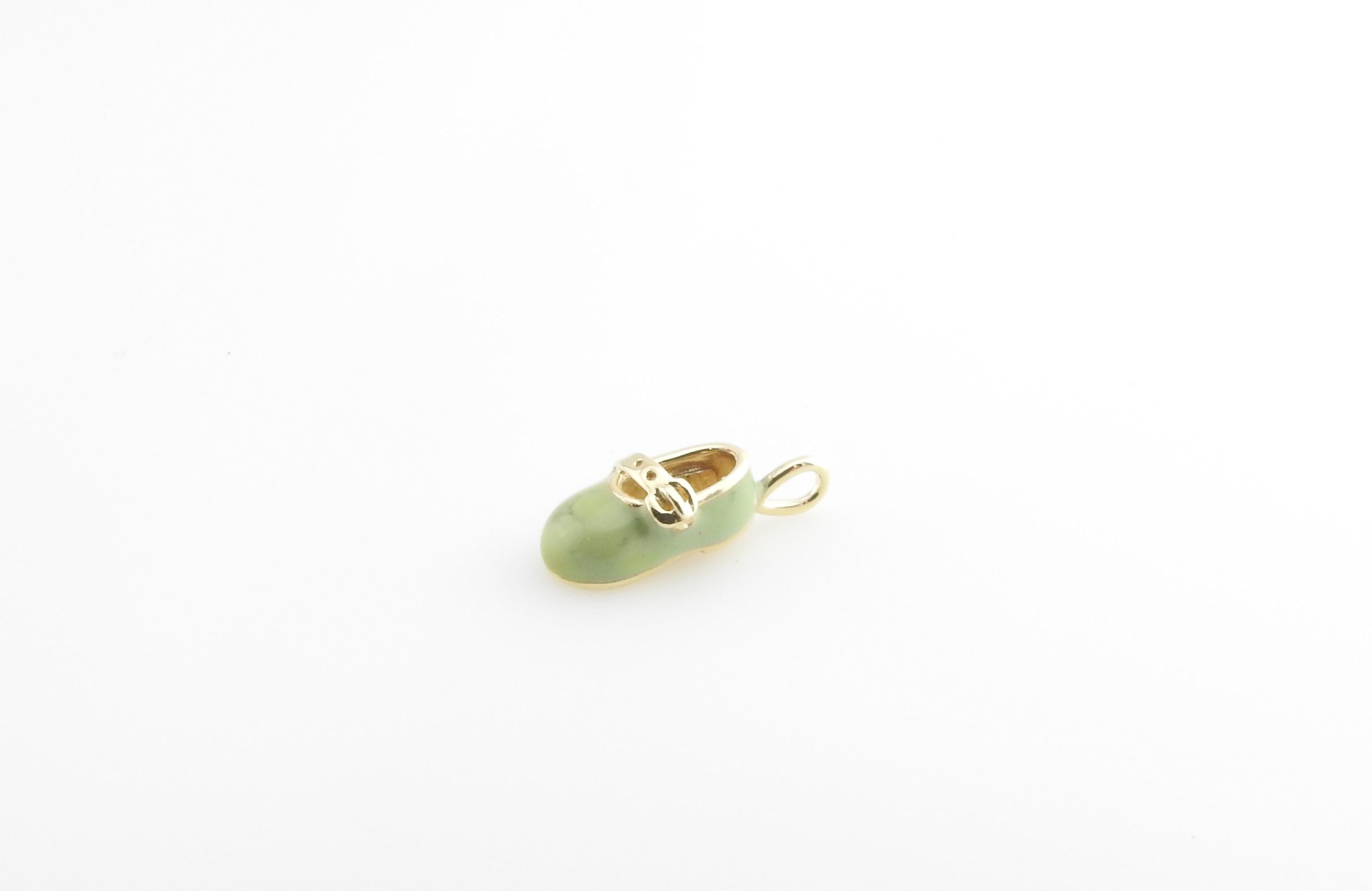 Vintage 10 Karat Yellow Gold and Light Green Enamel Baby Shoe Charm

Celebrate baby's first steps!

This lovely 3D charm features a miniature baby shoe accented with green enamel and crafted in beautifully detailed 10K yellow gold.

Size: 13 mm x 7