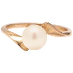 10 Karat Yellow Gold and Pearl Bypass Solitaire Ring