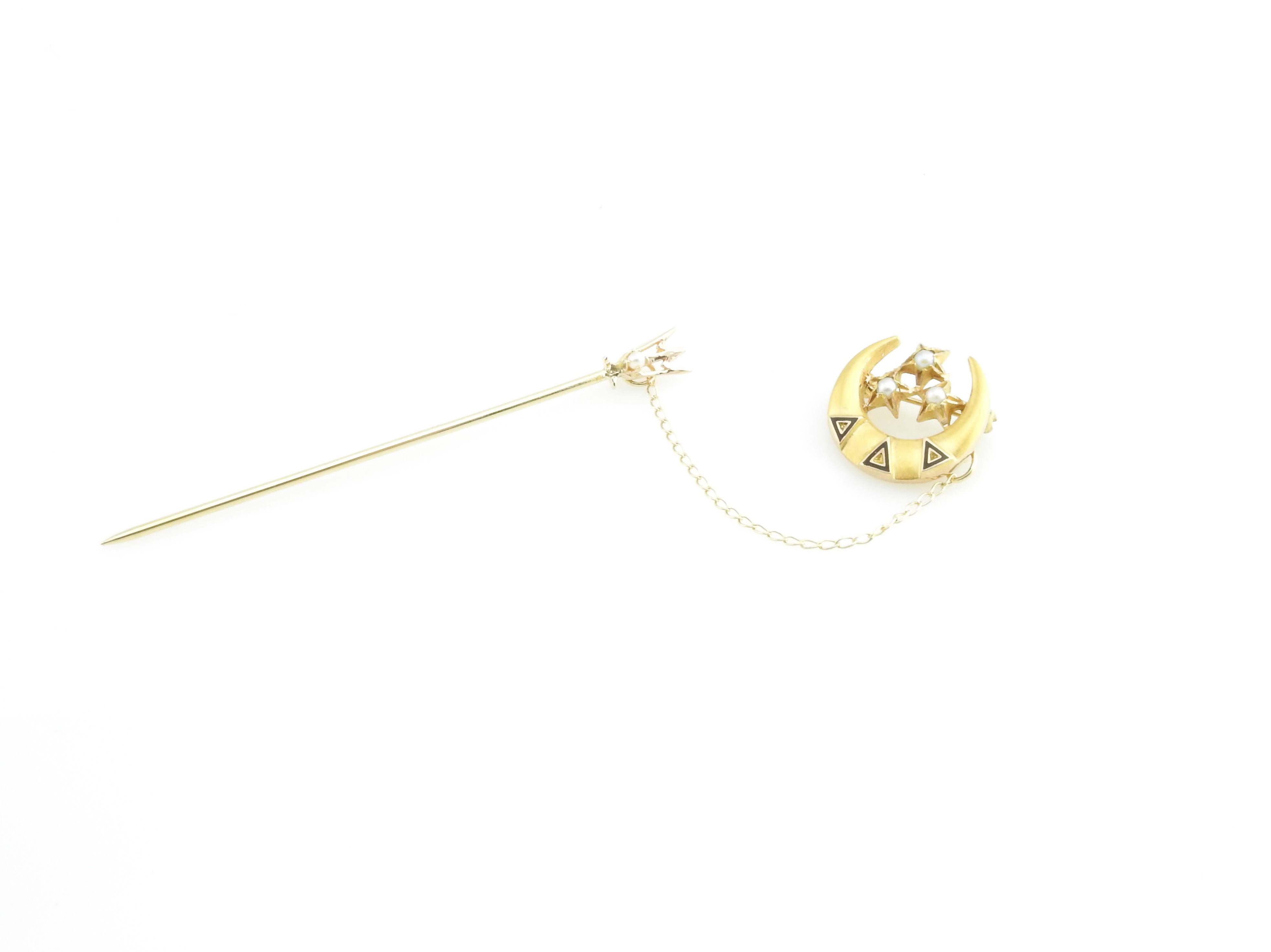 Vintage 10 Karat Yellow Gold Crescent Moon and Seed Pearl Stick Pin

This lovely stick pin features a crescent moon and stars accented with four seed pearls and elegant blue enamel. Crafted in beautifully detailed 10K yellow gold.

Size: 15 mm x 15