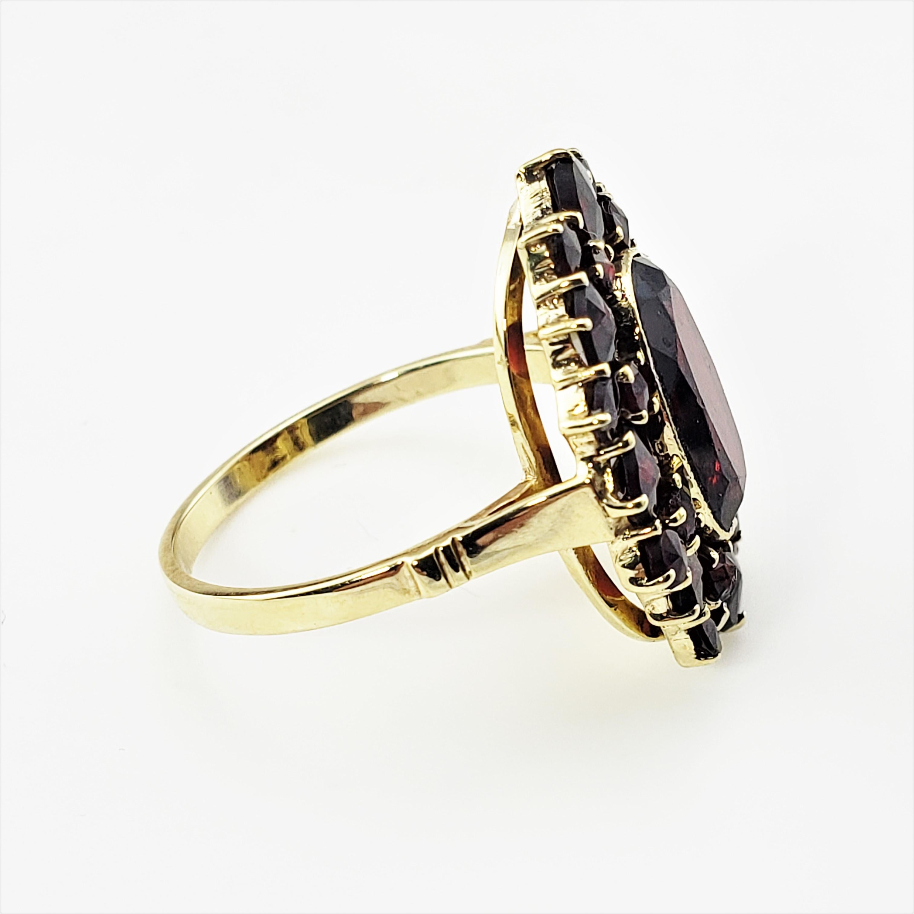Oval Cut 10 Karat Yellow Gold and Synthetic Garnet Ring