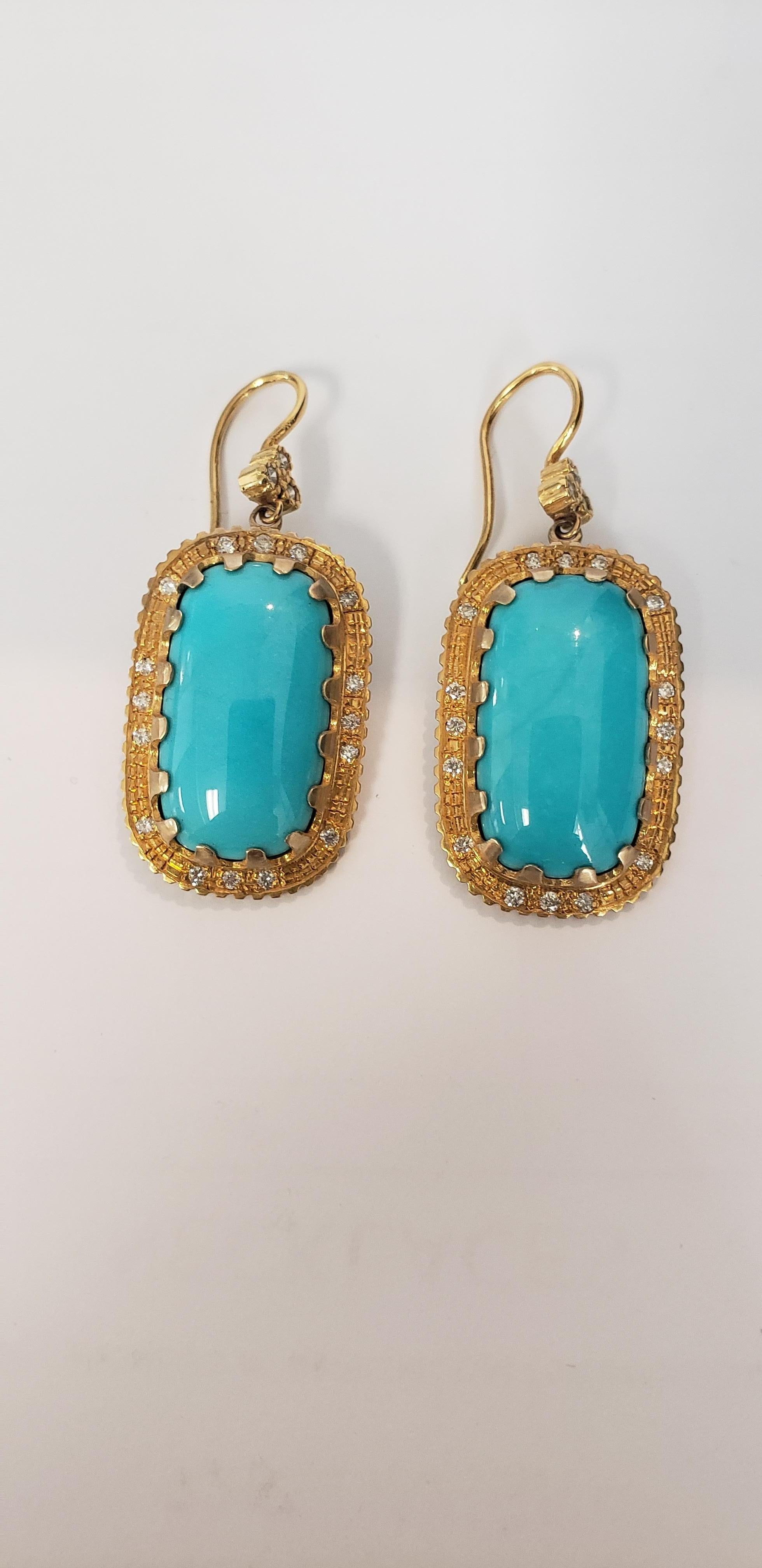 Earring- Matrix Kingman Turquoise with 23.75cts with Yellow Gold 0.40cts Diamond. Hand carved gold details made in our LA studio.