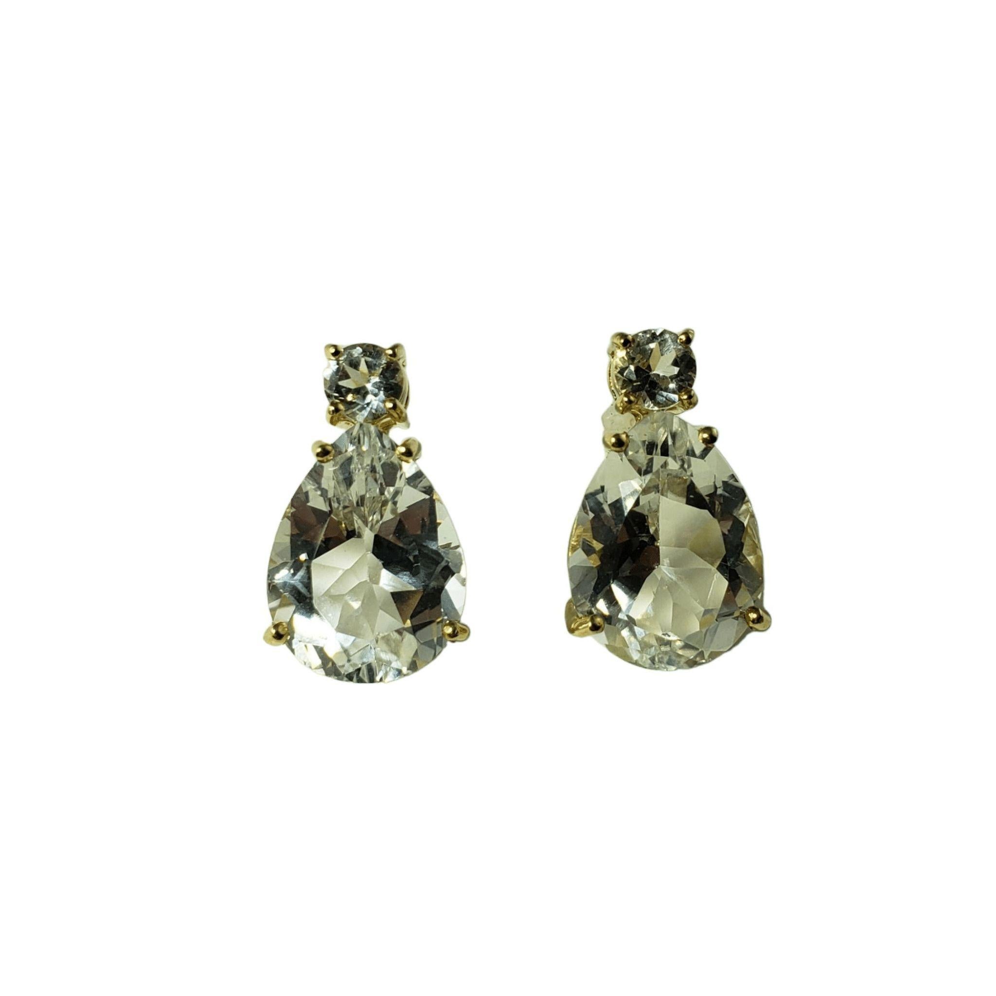 Vintage 10 Karat Yellow Gold and White Topaz Earrings JAGi Certified-

These elegant earrings each feature one pear cut white topaz (16 mm x 12 mm) and one round cut white topaz (5 mm) set in classic 10K yellow gold.

Total topaz weight: 22.04