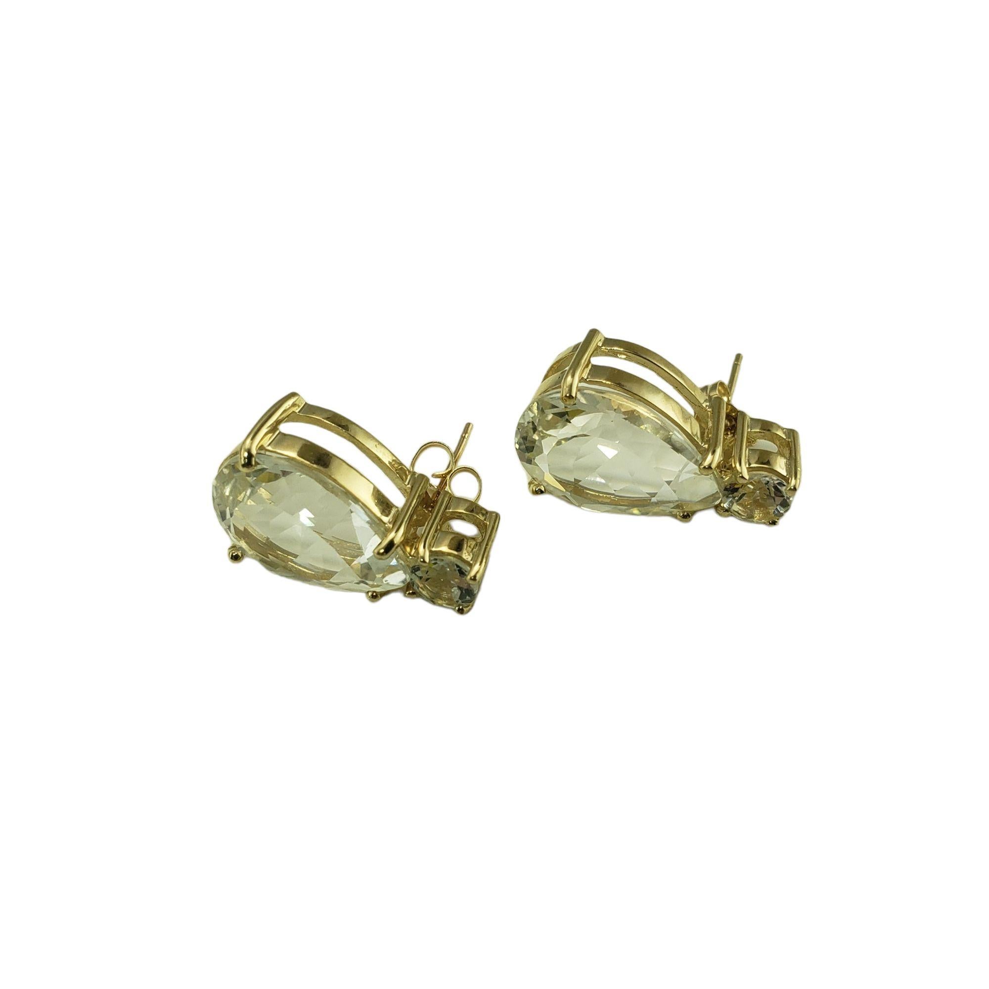 Vintage 10 Karat Yellow Gold White Topaz Earrings JAGi Certified-

These lovely earrings each feature one pear shaped white topaz (16 mm x 12 mm) and one round white topaz (5 mm) set in classic 14K yellow gold. Push back closures.

Total topaz