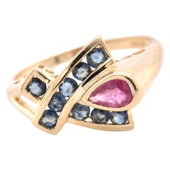 10 Karat Yellow Gold Blue and Pink Sapphire X Ring