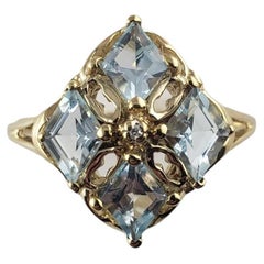 10 Karat Yellow Gold Blue Topaz and Diamond Ring #14036