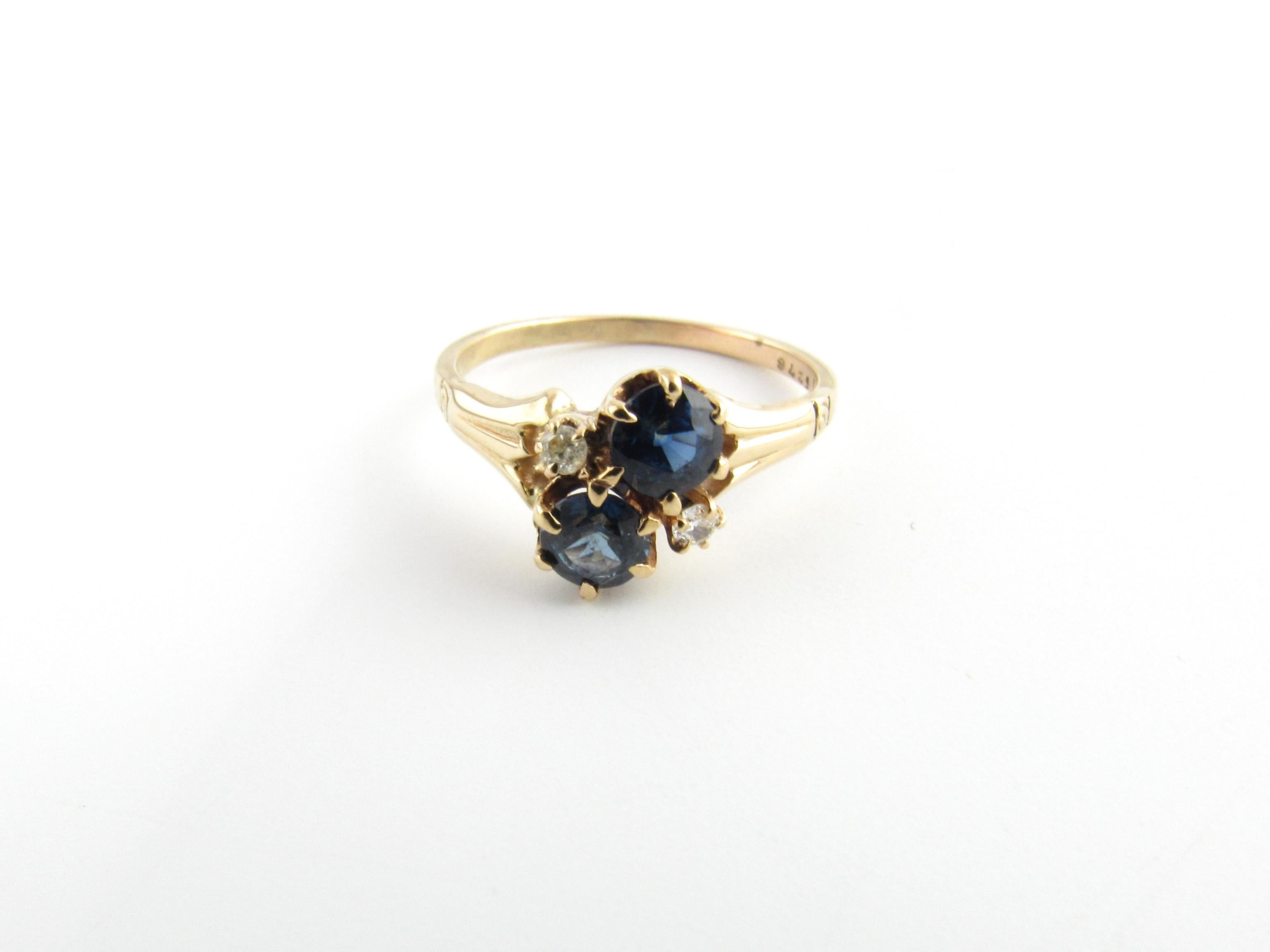 Women's 10 Karat Yellow Gold Blue Topaz and Diamond Ring