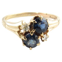 10 Karat Yellow Gold Blue Topaz and Diamond Ring