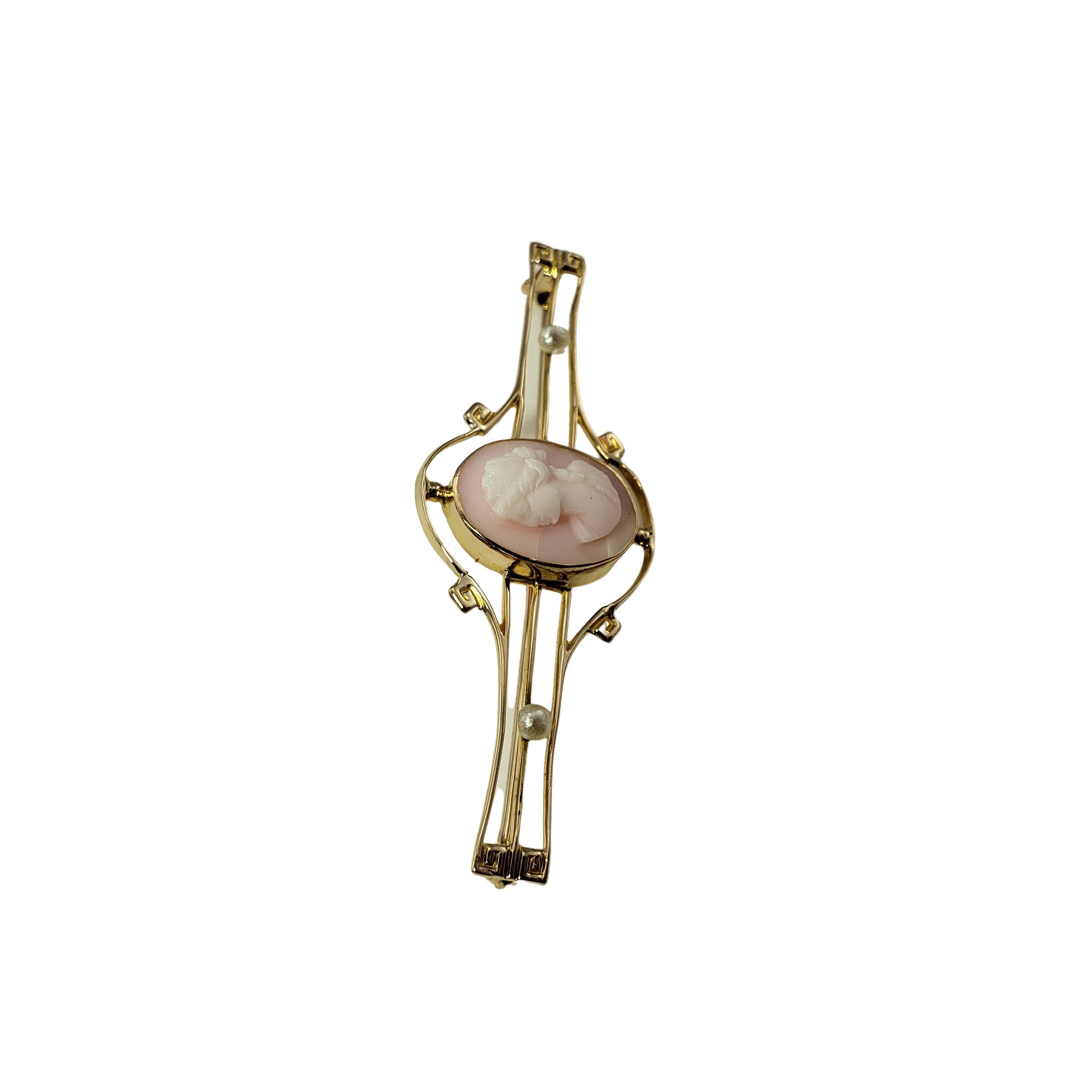 10 Karat Yellow Gold Cameo Bar Pin/Brooch-

This lovely pink cameo bar pin is accented with two seed pearls set in classic 10K yellow gold.

Size:  53 mm x 19 mm

Weight:  1.8 dwt. /  2.8 gr.

Stamped: 10K 

Very good condition, professionally