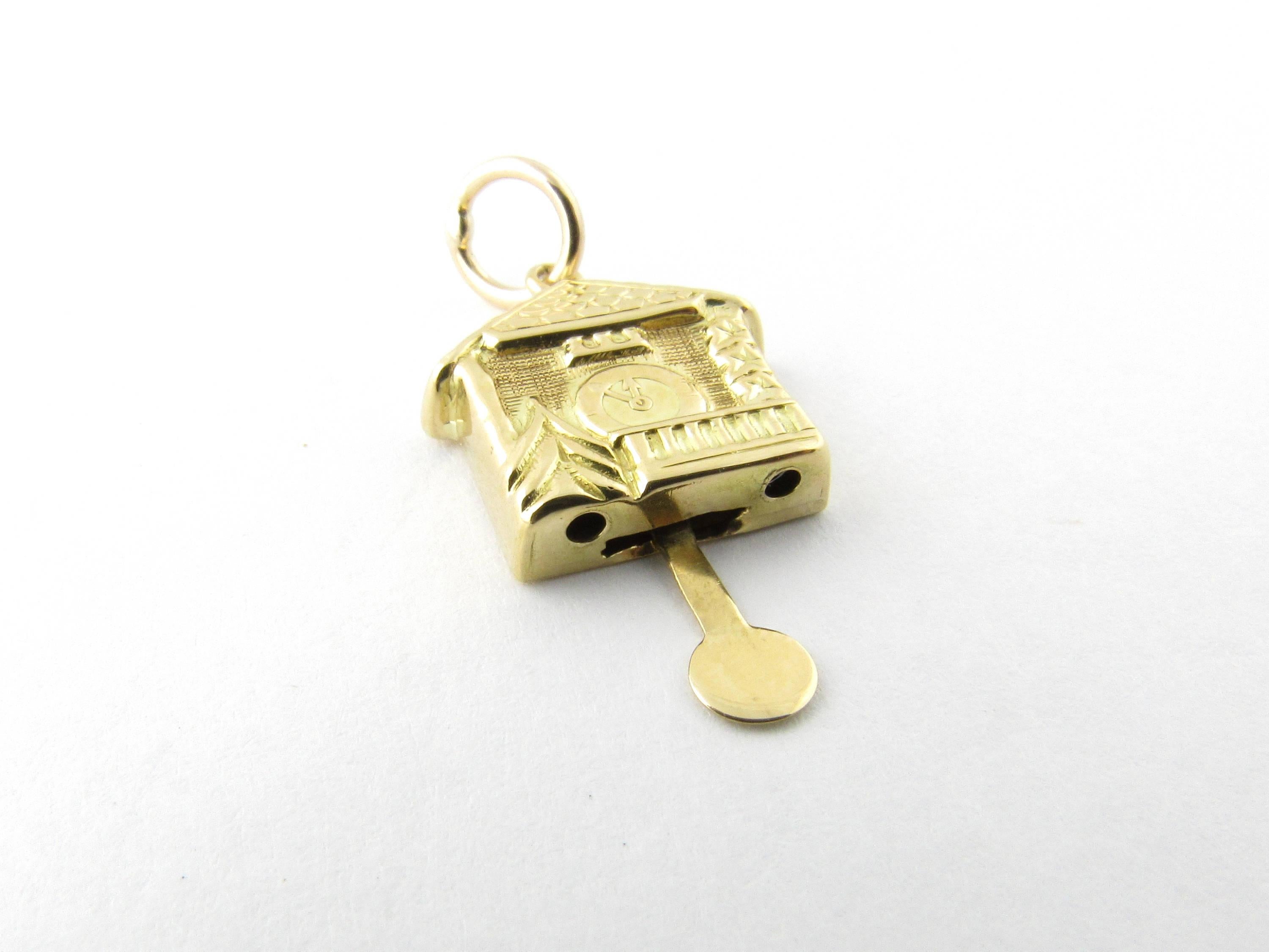 Vintage 10 Karat Yellow Gold Cuckoo Clock Charm- 
This 3D mechanical charm features a miniature cuckoo clock with moving pendulum beautifully detailed in 10K yellow gold. 
Size:  22 mm x  13 mm (actual charm) 
Weight: 0.7 dwt. /  1.2 gr. 
Hallmark: