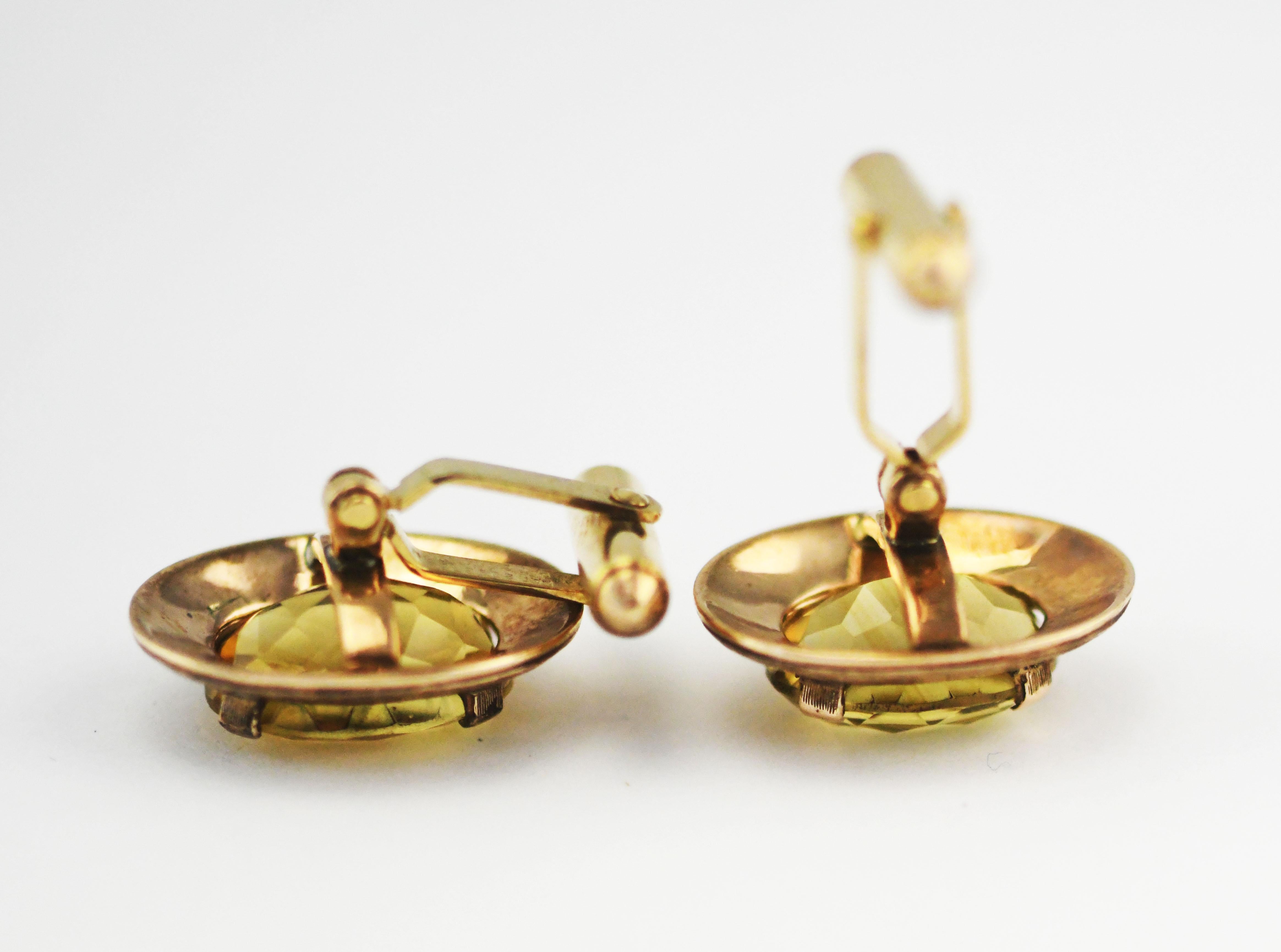 10 Karat Yellow Gold Cufflinks with Natural Yellow Citrine Stones 21mm wide x 16mm tall. it is 35mm from the front to the end of the toggle clasp. Wonderful clarity. The gold has a petina on the textured edge. Beautiful pieces are well built. 