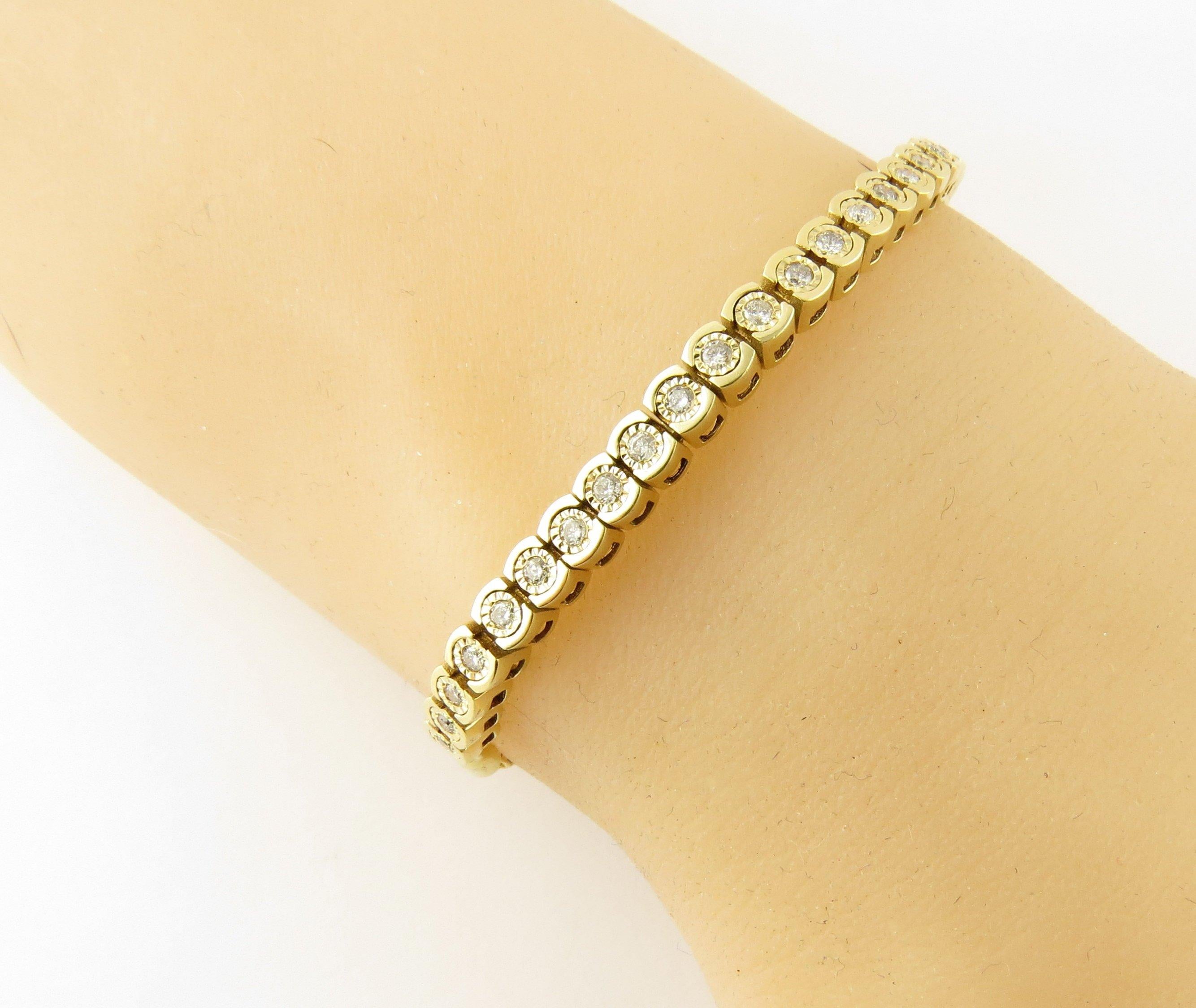 Vintage 10 Karat Yellow Gold Diamond Bracelet- 
This stunning toggle bracelet features 26 round brilliant cut diamonds set in classic 10K yellow gold. 
Approximate total diamond weight: .78 ct. 
Diamond color: H-I 
Diamond clarity: SI1-I1 
Size: