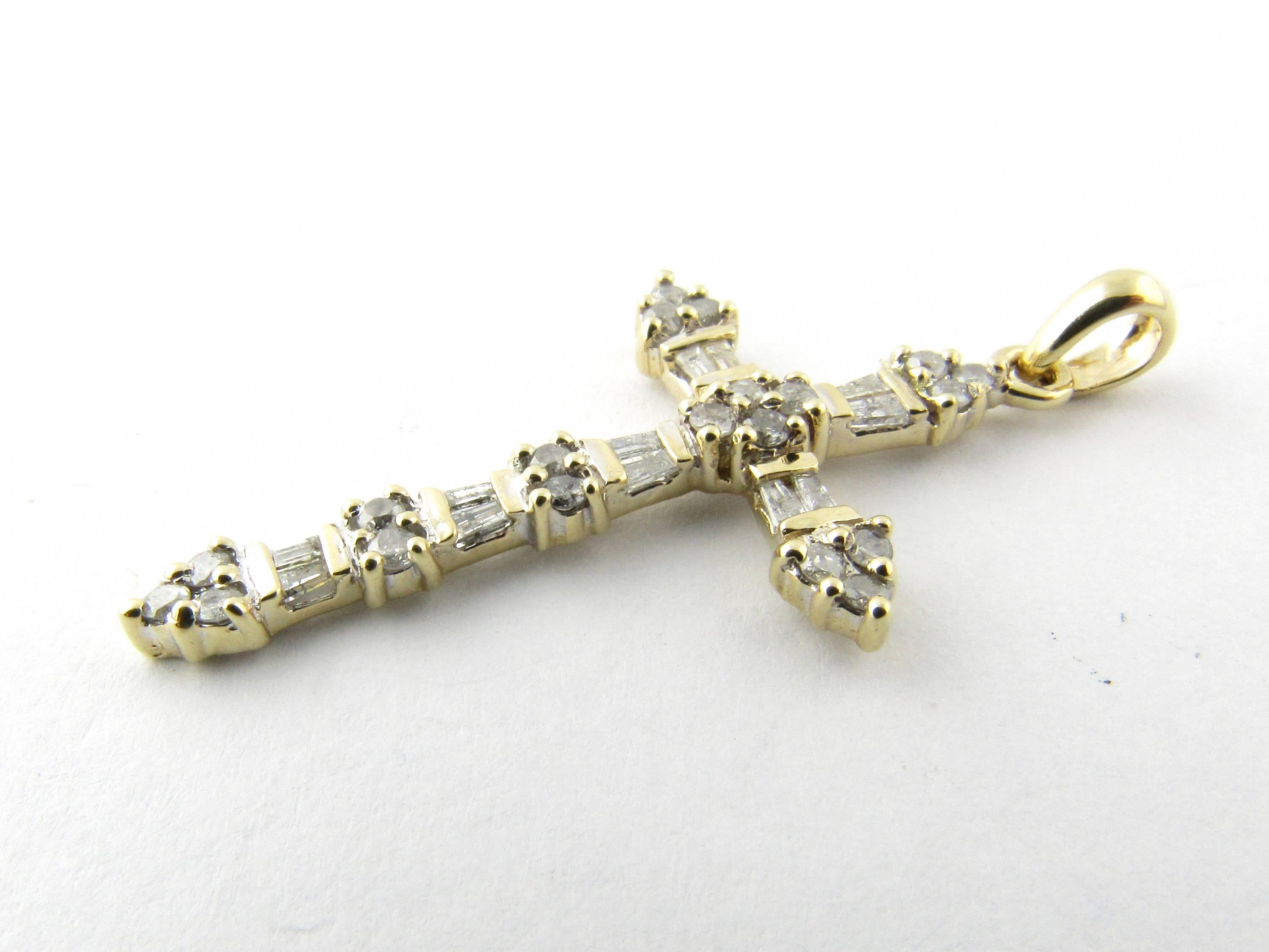 Vintage 10 Karat Yellow Gold Diamond Cross Pendant- 
This sparkling pendant features 20 round brilliant cut diamonds (.40 ct. twt.) and 12 baguette diamonds (.24 ct. twt.) set in a lovely cross design. 
Approximate total diamond weight: .64 ct.