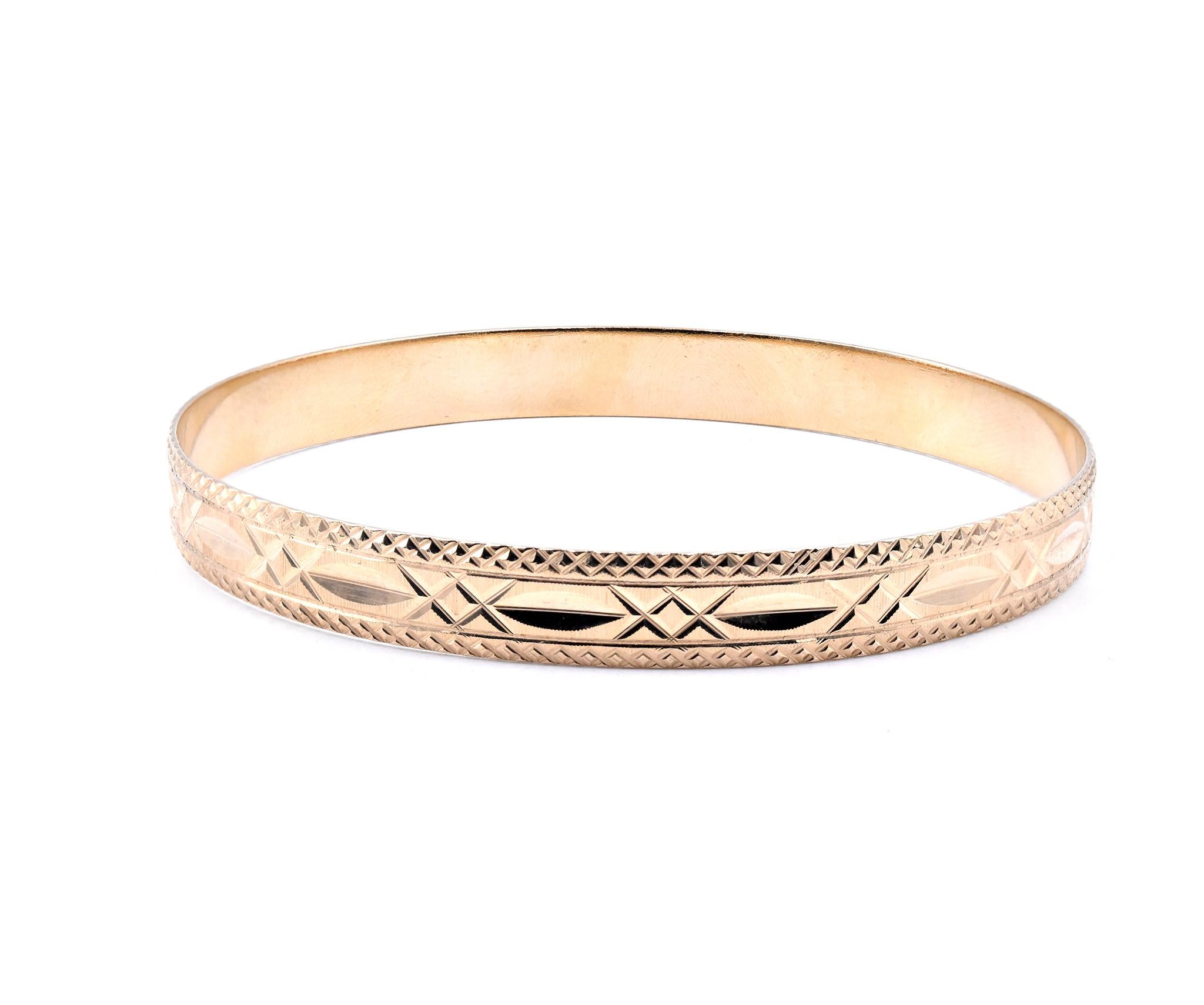 Designer: custom
Material: 10K yellow gold
Dimensions: bracelet will fit up to a 8-Inch wrist
Weight: 17.67 grams
