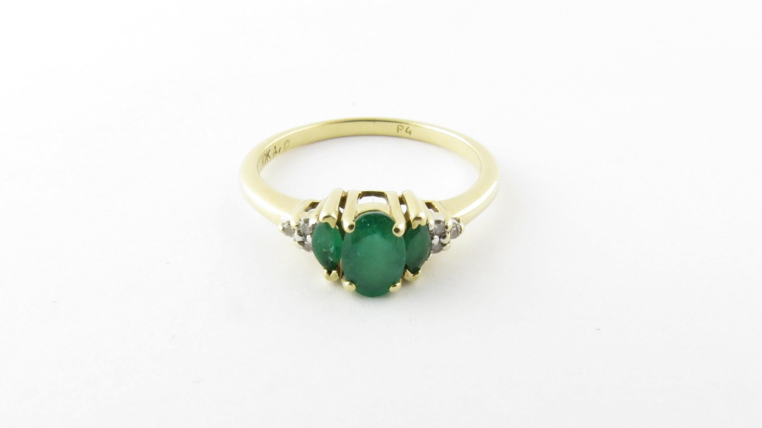 Vintage 10 Karat Yellow Gold Emerald and Diamond Ring Size 6.75- This lovely ring features three genuine emeralds (center: 6 mm x 4 mm, sides: 4 mm x 2 mm) accented with six single cut diamonds set in classic 14K yellow gold. Shank: 2 mm.