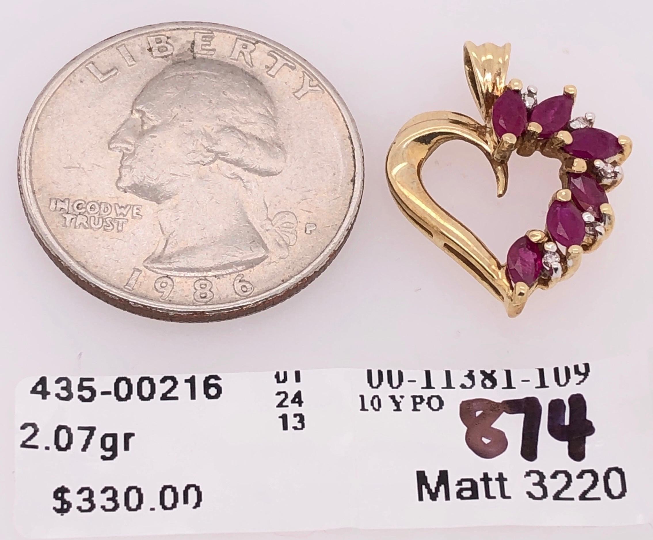 10 Karat Yellow Gold Heart Pendant with Amethyst and Diamonds 
2.07 grams total weight.