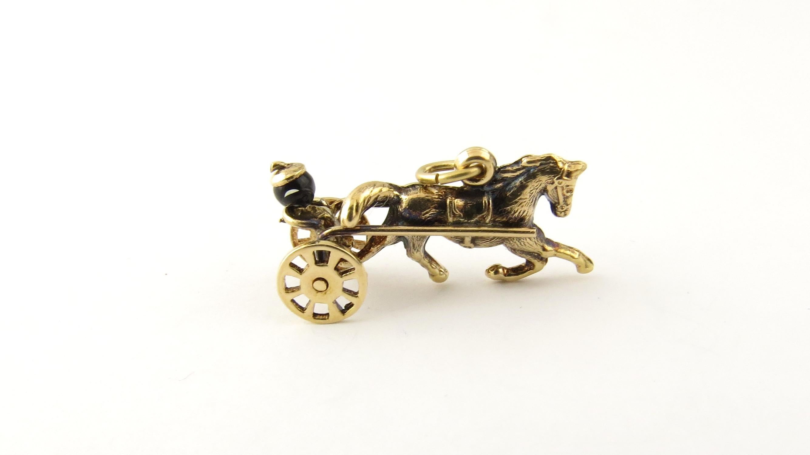 Vintage 10 Karat Yellow Gold Horse and Sulky with Driver Charm

This lovely 3D charm features a miniature horse and driver in a sulky with moving wheels. Beautifully detailed in 10K yellow gold.

Size: 13 mm x 24 mm

Weight: 1.2 dwt. / 1.9 gr.

Acid