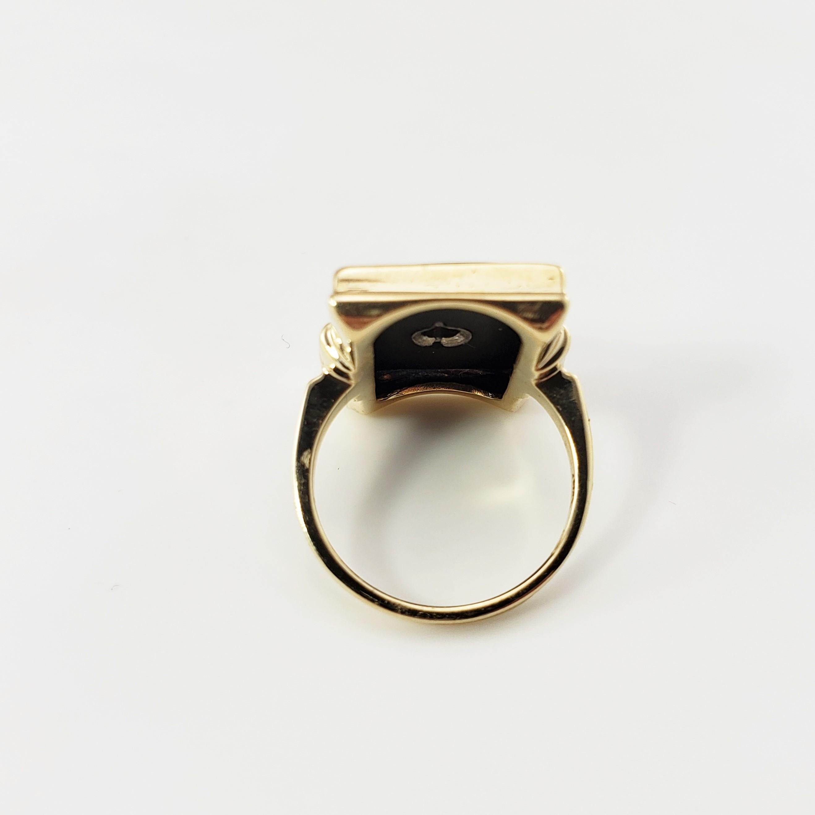 Women's 10 Karat Yellow Gold Onyx and Diamond Ring