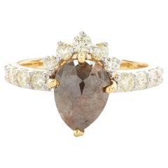 10 Karat Yellow Gold Pear Shape Galaxy Diamond Ring with Crown Halo
