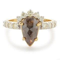 10 Karat Yellow Gold Pear Shape Galaxy Diamond Ring with Diamond Crown Halo