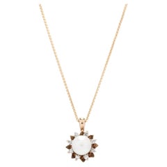 10 Karat Yellow Gold Pearl & Diamond Starburst Necklace