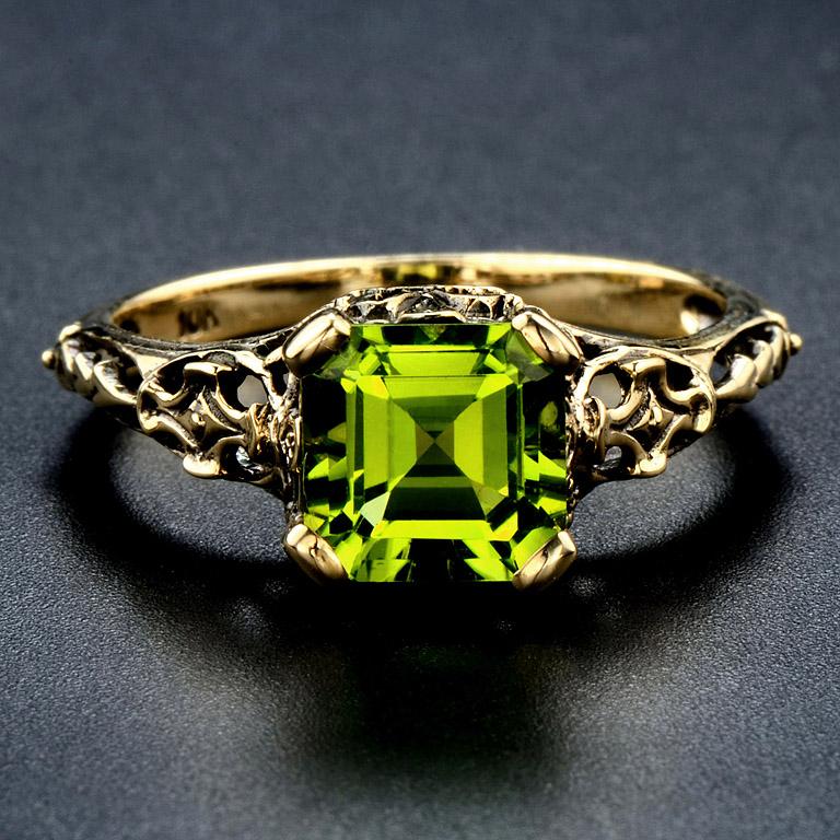 Filigree Style 10 Karat Yellow Gold Ring set with Step Cut Natural Peridot 1.78 Carat.

This Ring was made in size US#7


