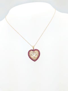 10 Karat Yellow Gold Ruby and Diamond Heart Pendant Necklace