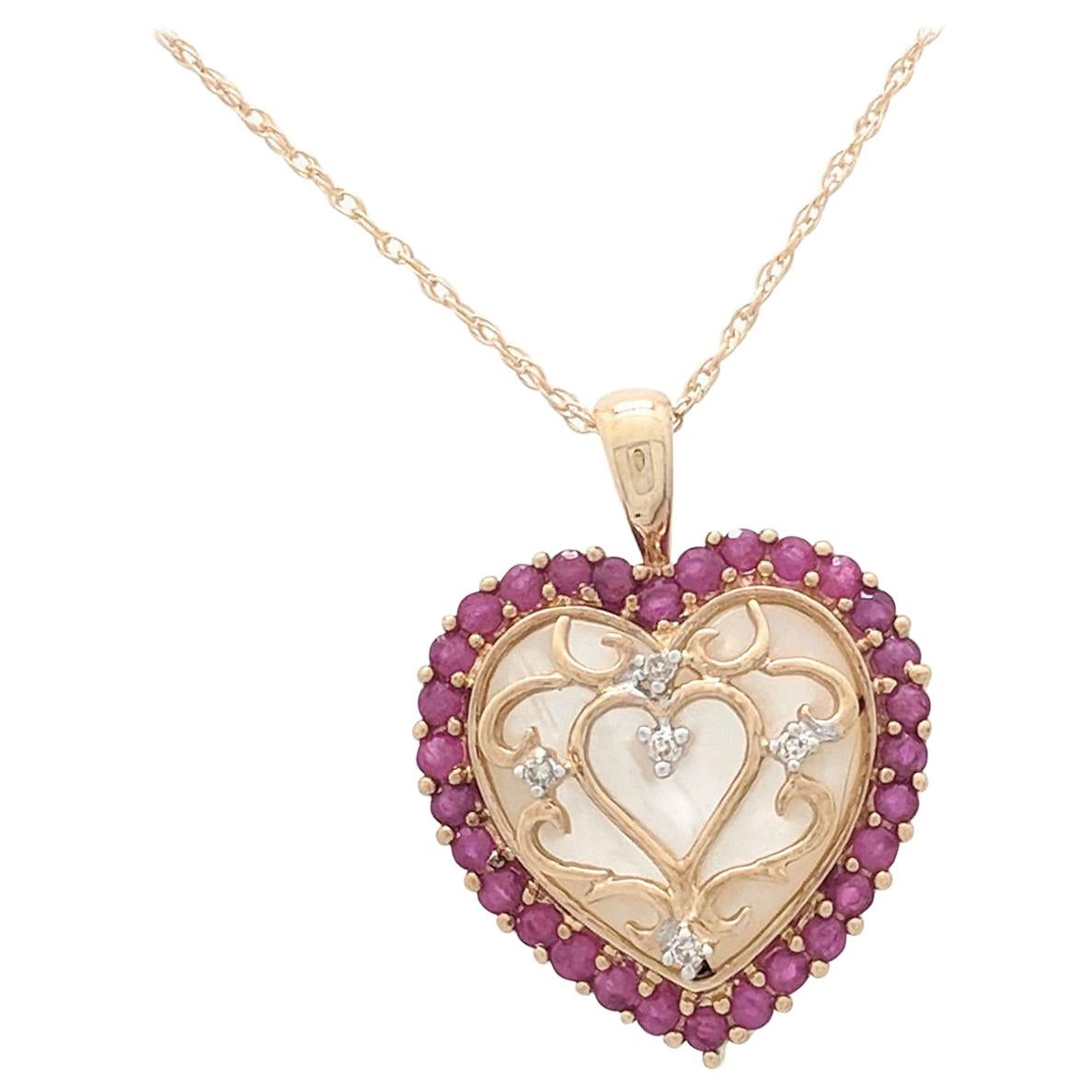 10 Karat Yellow Gold Ruby and Diamond Heart Pendant Necklace For Sale