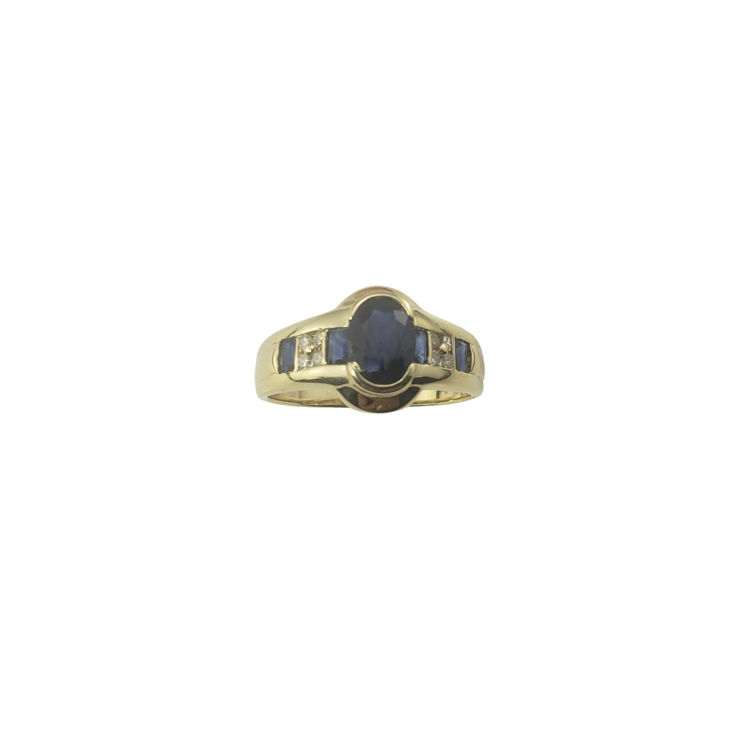 14 Karat Yellow Gold Sapphire and Diamond Ring Size 7-

This lovely ring features oval sapphire (5 mm x 4 mm), four baguette sapphires and eight round single cut diamonds set in classic 10K yellow gold.  Width:  10 mm.  Shank:  2.5 mm.

Approximate