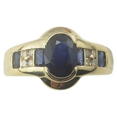 Ring aus 10 Karat Gelbgold mit Saphir und Diamant