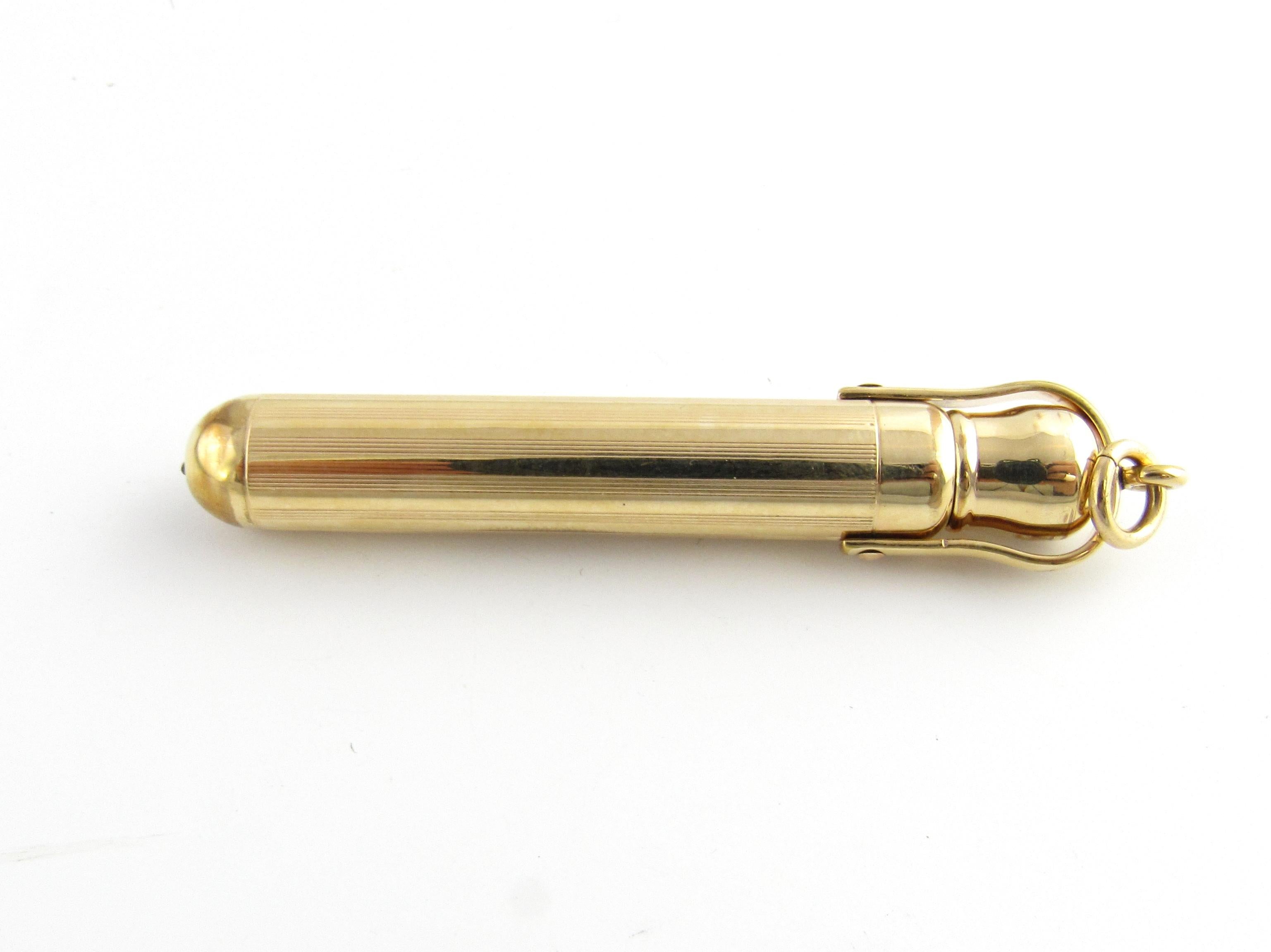 10 Karat Yellow Gold Telescopic Pencil-

This elegant piece features a telescopic pencil that opens to 110 mm. Case has hanging ring to attach to chain or fob. Slight dent noted on case.

Size: 67 mm x 9 mm 

Weight: 13.8 dwt. / 21.5 gr.

Hallmark:
