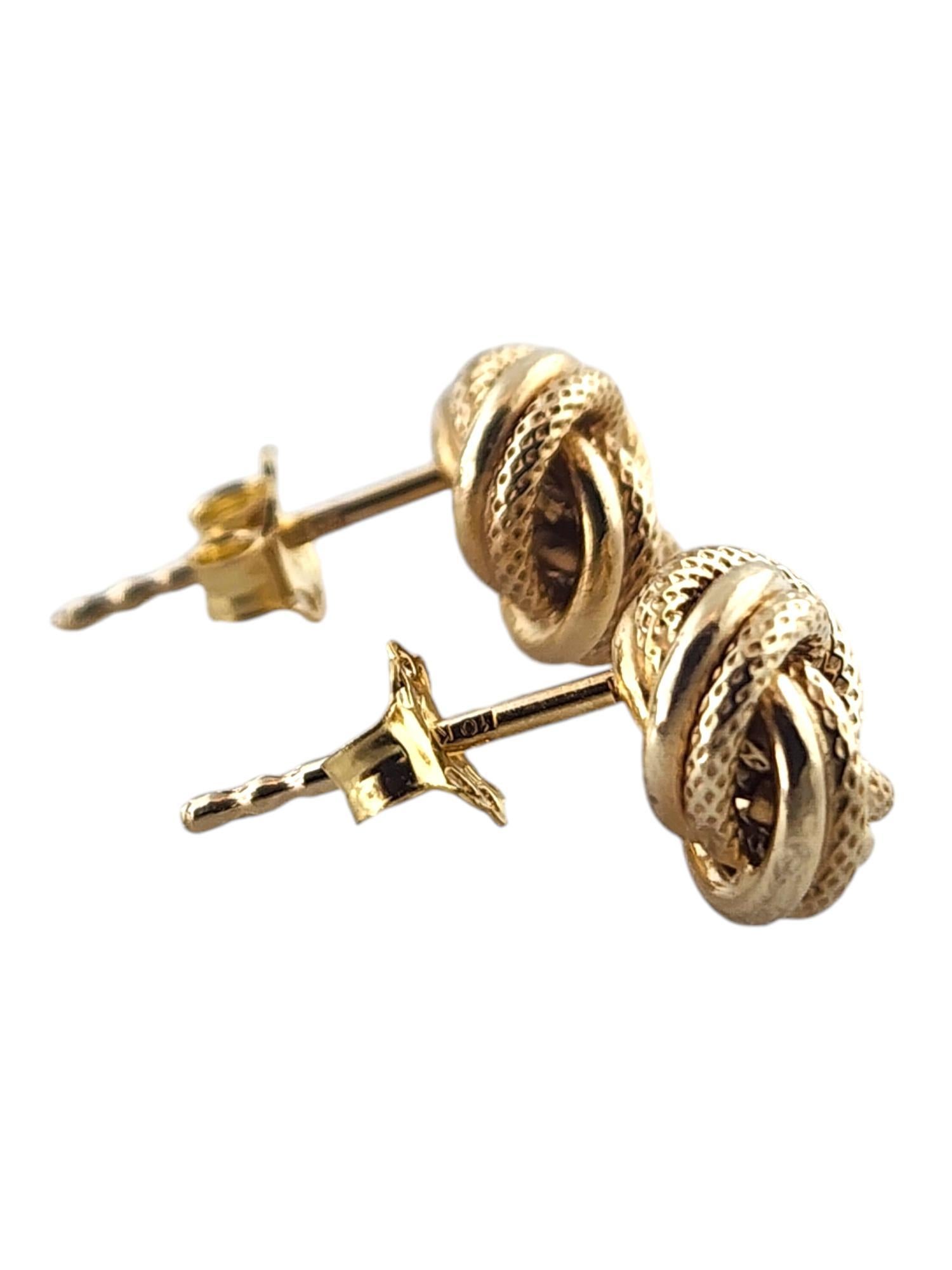 Women's 10 Karat Yellow Gold Textured Love Knot Stud Earrings #18990 For Sale