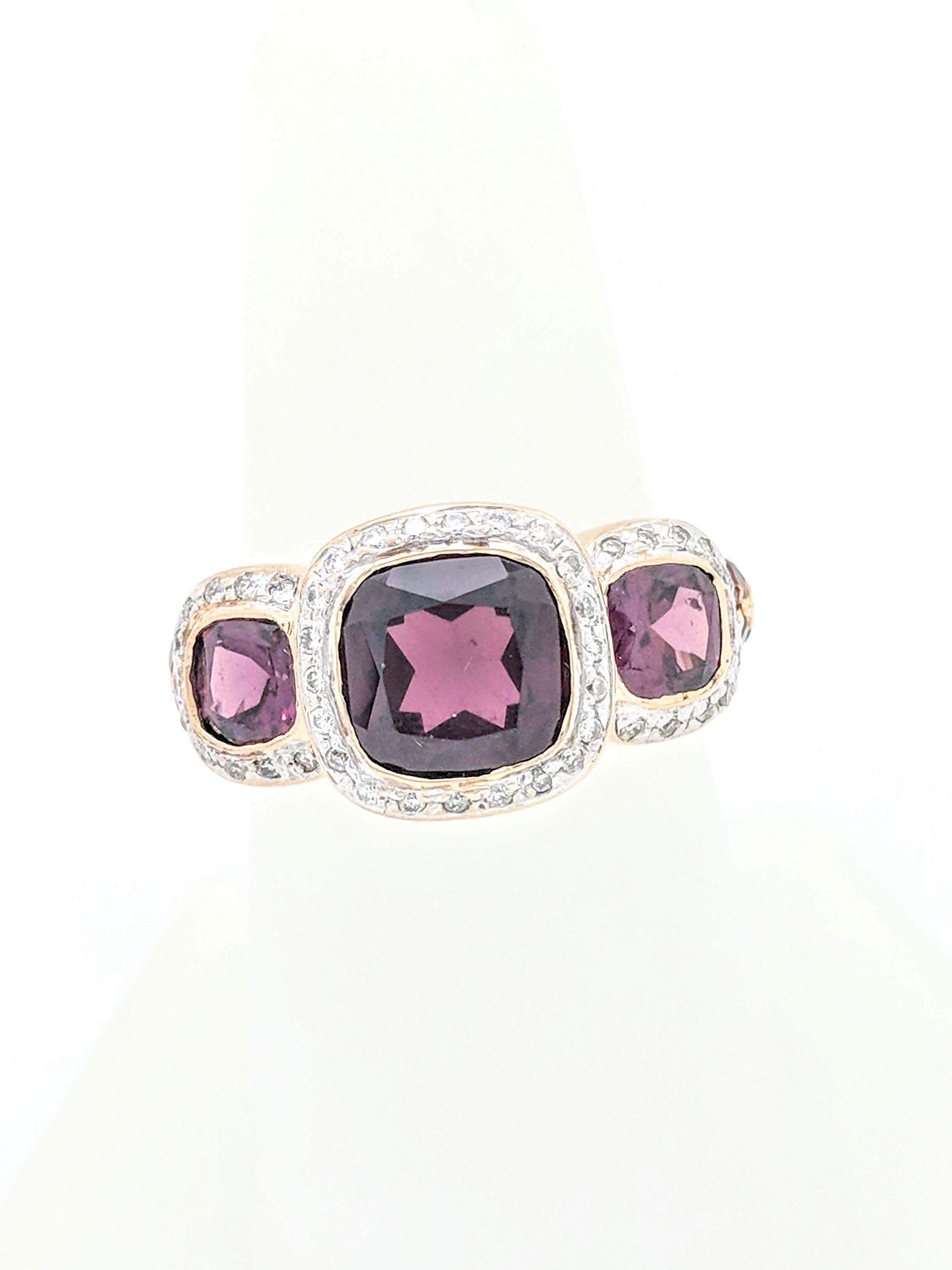 Contemporary 10 Karat Yellow Gold Tourmaline and Diamond Three-Stone Halo Ring