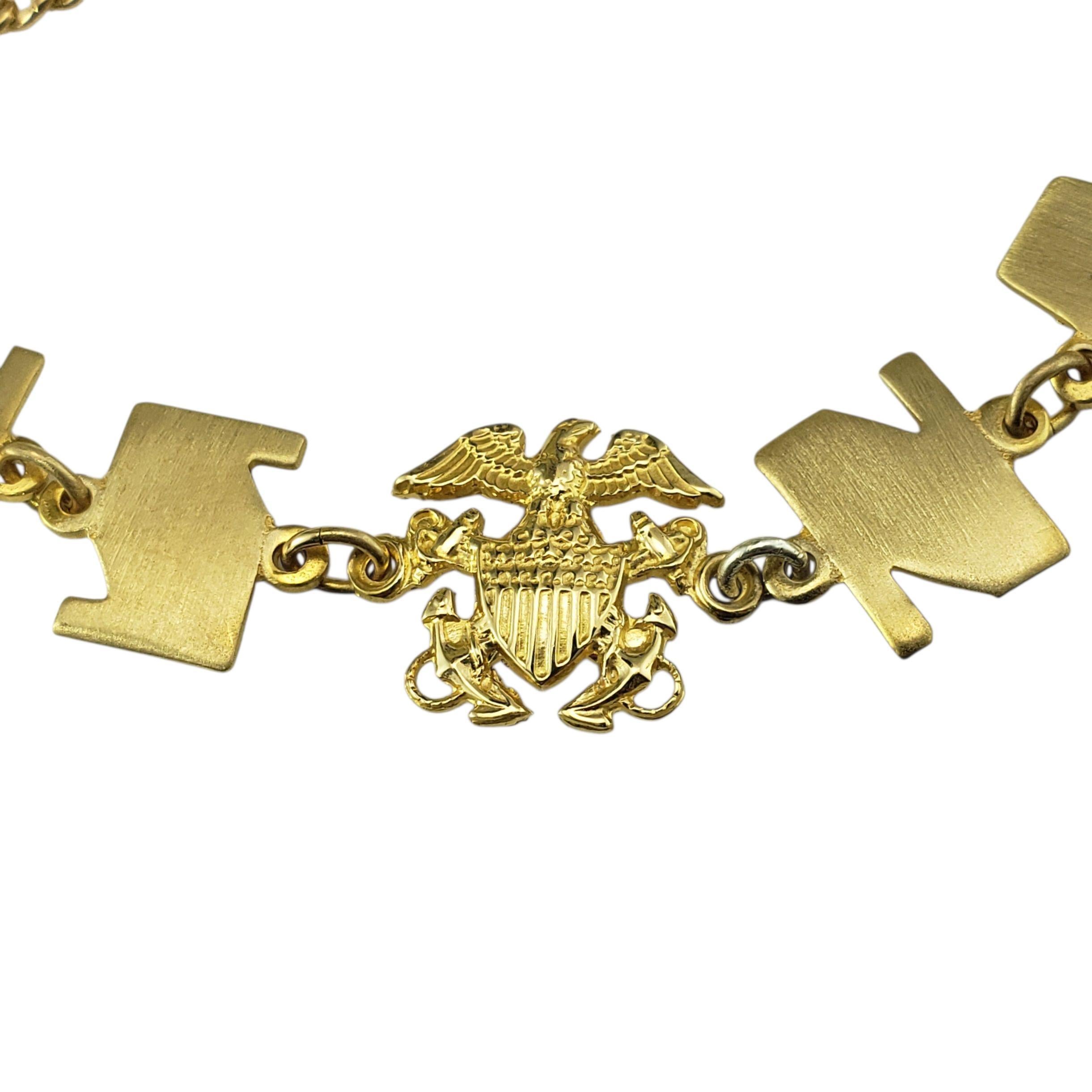 10 Karat Yellow Gold U.S. Navy Bracelet-

Show your pride with this striking 14K yellow gold U.S. Navy bracelet. Featuring bold, stylized block letters spelling 