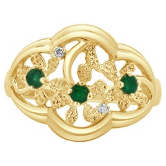 10 Karat Gelbgold Vintage-Ring mit Smaragd und Diamant im floralen Ausschnitt mit Blumenschliff