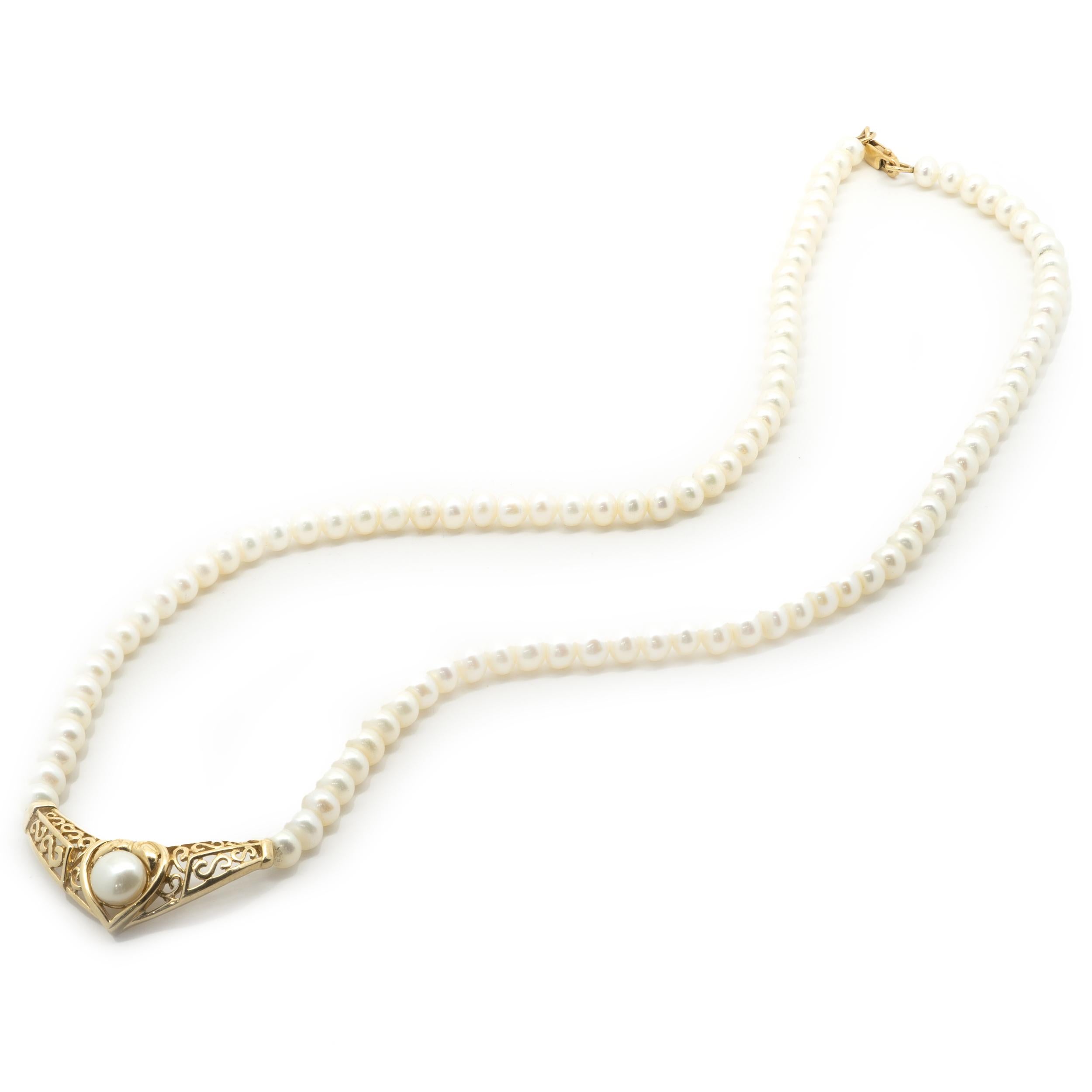 Designer: Custom
Material: 10K yellow gold
Pearl: potato pearl = 4.60 +/- mm
Dimensions: necklace measures 16-inches in length
Weight: 14.21 grams
