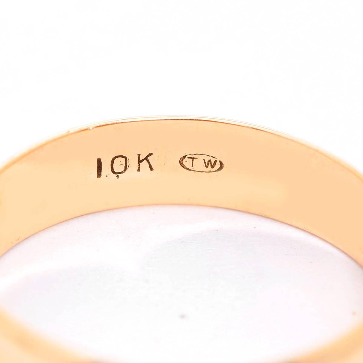 10K Yellow Gold Wedding Band  - This great band is so comfortable and is great for everyday wear or for dressing up with the popularity of yellow gold at the present time. 4mm wide. 1.9 grams. Size 5.5.