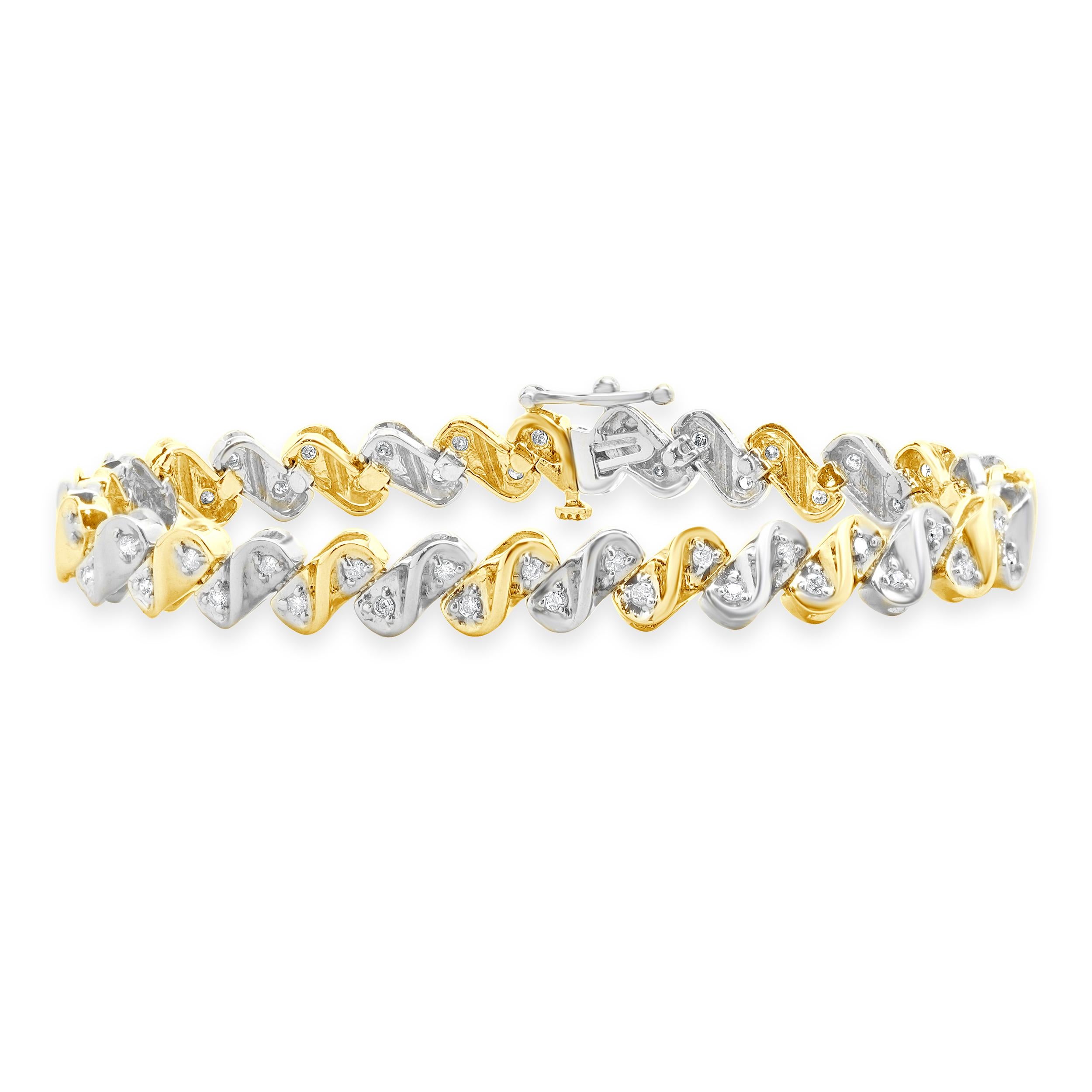 Designer: custom
Material: 10K yellow & white
Diamond: 60 round brilliant cut = 0.60cttw
Color: I
Clarity: I1-3
Dimensions: bracelet will fit up to a 7-inch wrist
Weight: 12.75 grams