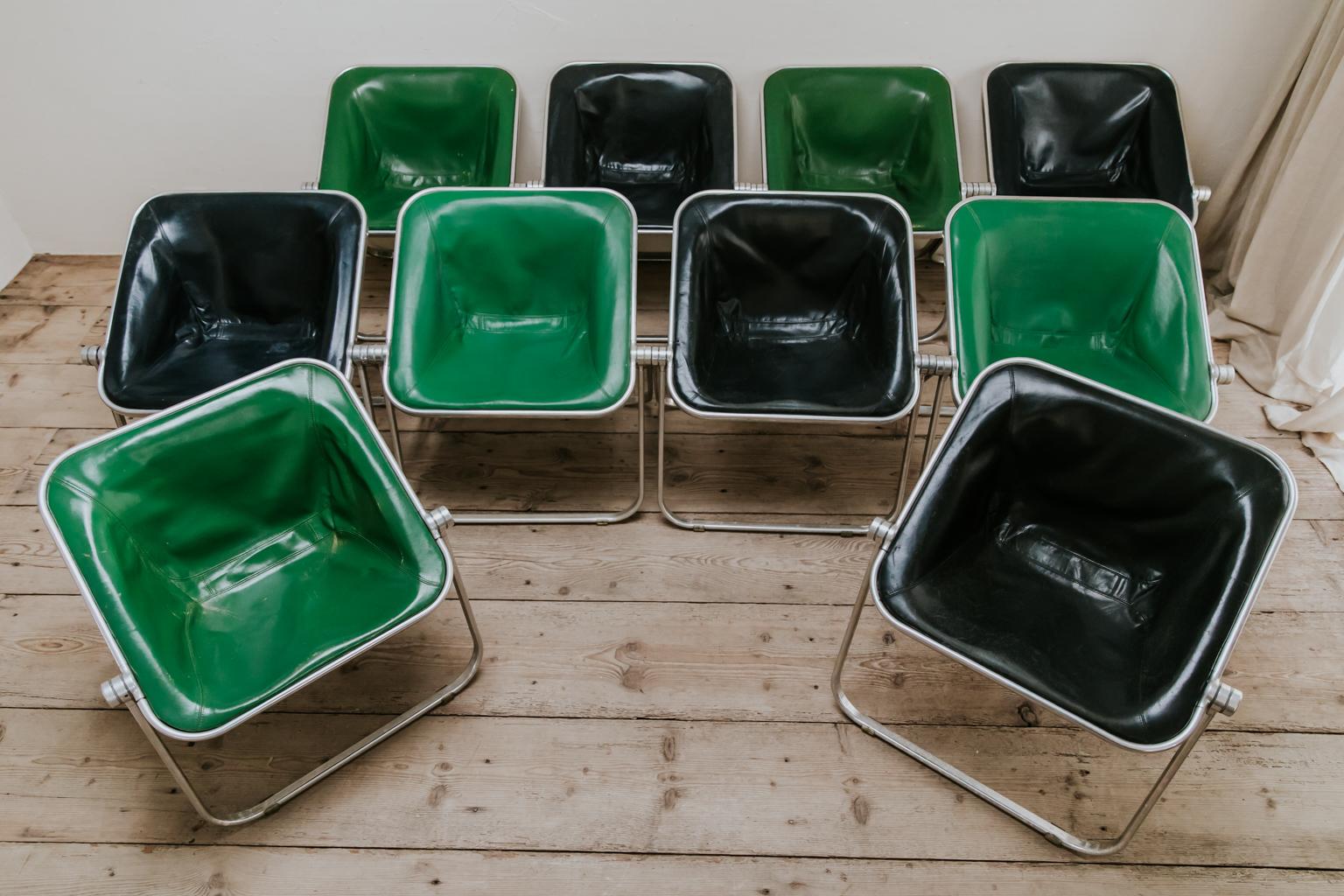 A gorgeous midcentury design set of 10 geen and dark blue Plona folding chairs,
Italian design, 1969, Giancarlo Pretti for Castelli
9 chairs are 68 cm wide x 73 cm high, seat height 47 cm x 55 cm deep
One green chair is smaller 68 cm wide x 71 cm