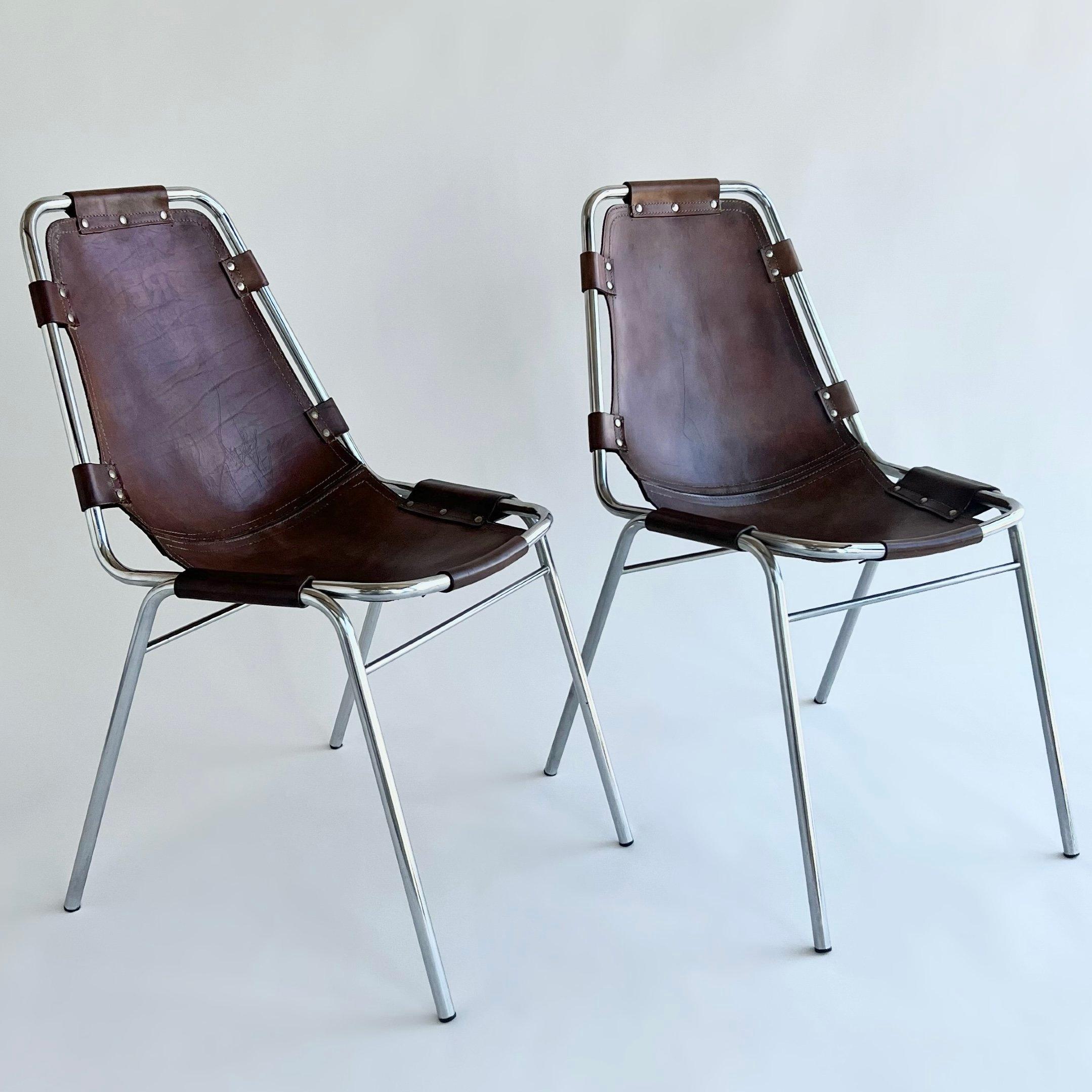 Set of 10 chrome and cognac leather dining chairs selected by Charlotte Perriand for Les Arcs Ski Resort. Manufactured by DalVera, Italy. Circa 1960's
