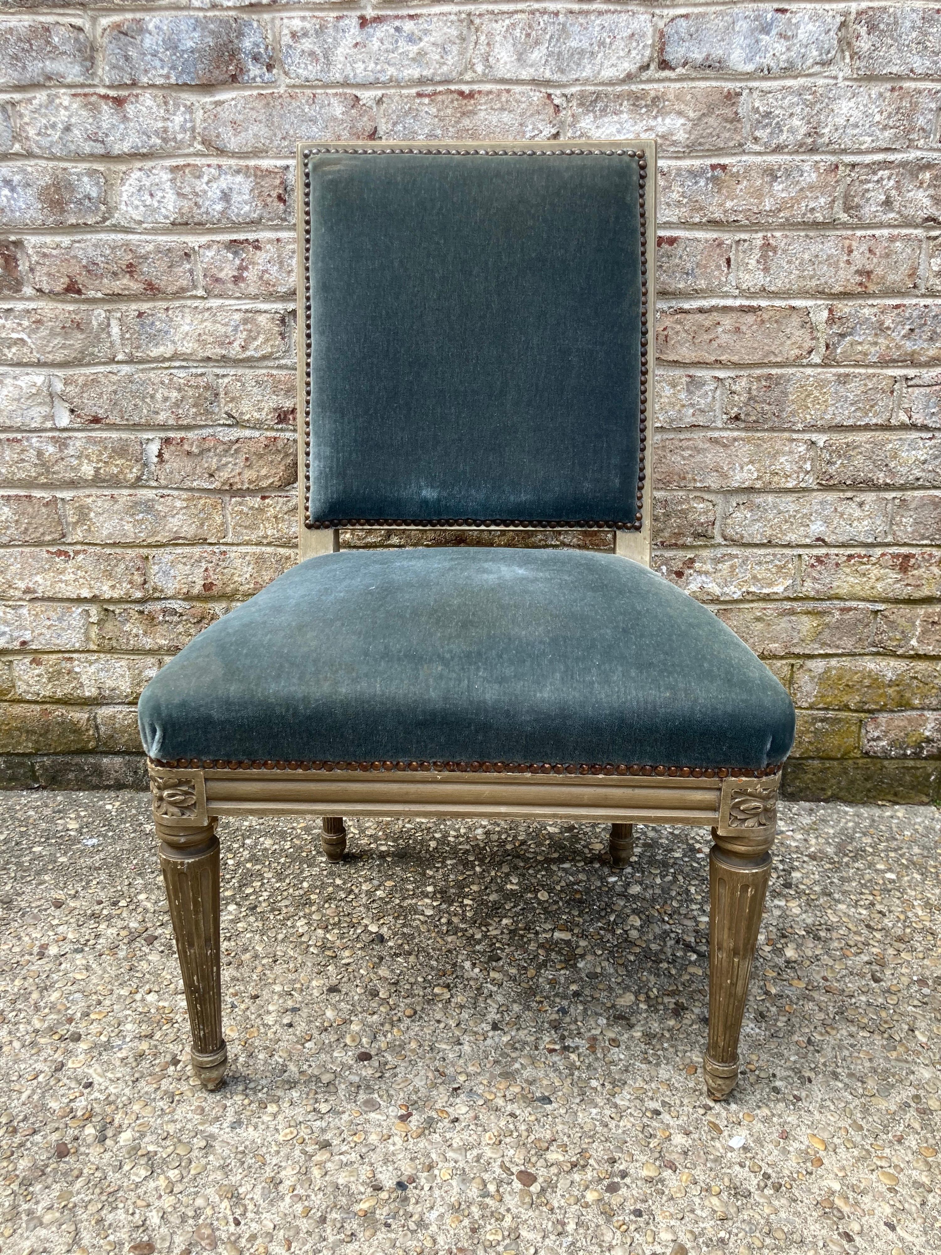 A very grand and elegant set of 10 Louis XVI style dining chairs.... very comfortable with ample seats.... in the original blue mohair fabric....
