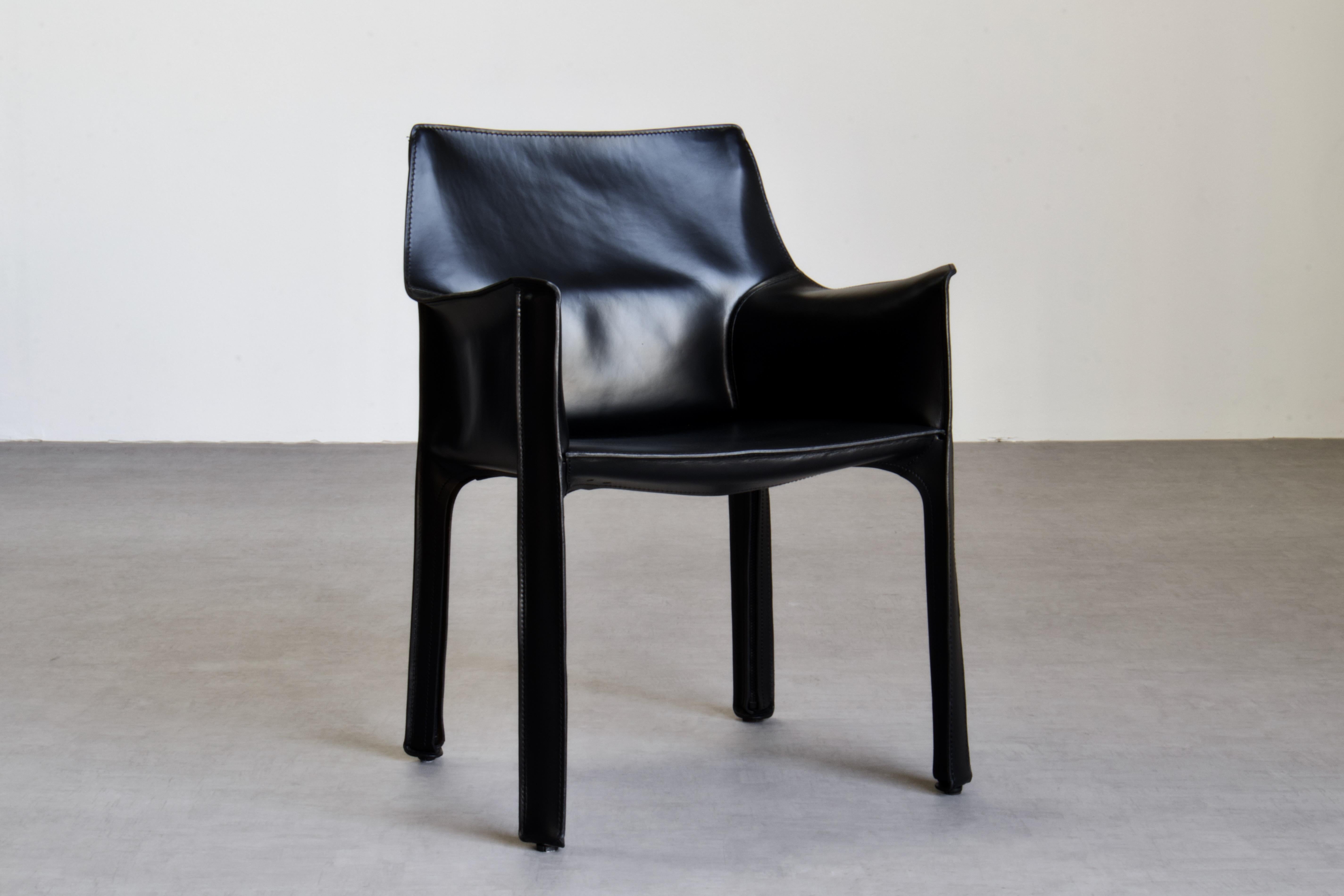 Set of 10 Mario Bellini CAB 413 chairs, made by Cassina. Flexible steel frame covered with a skin of high quality vintage black saddle leather. 

The chairs, which were already in very good condition, have been thoroughly refreshed by our atelier