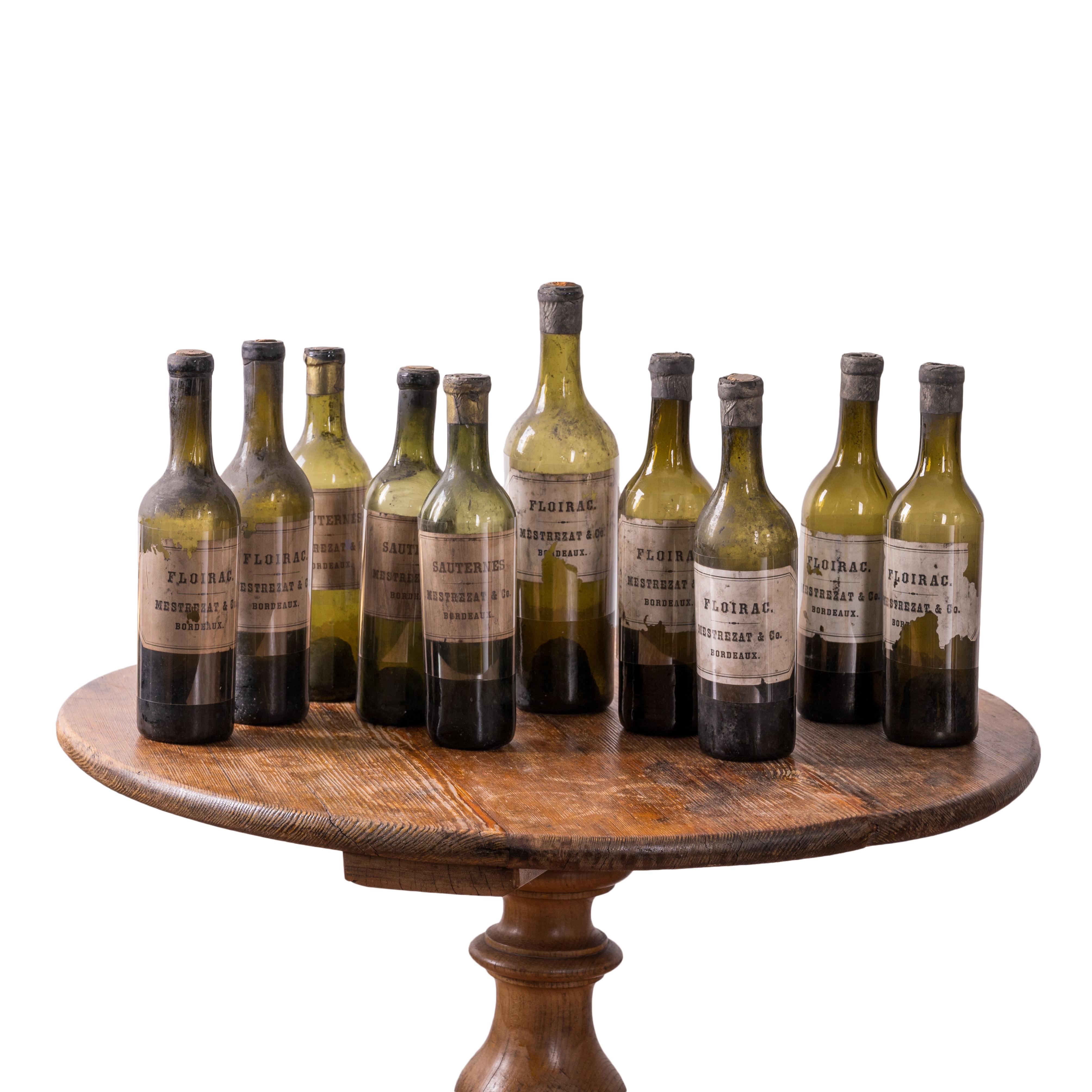 Lote de 10 Mestrezat & Co. Botellas de Floirac y Sauternes de Burdeos, hacia la década de 1870.
Estas botellas proceden de la bodega histórica de la Casa Owens-Thomas, en los Museos Telfair de Savannah (Georgia). 

2 ¼ pulgadas de ancho por 9 ½