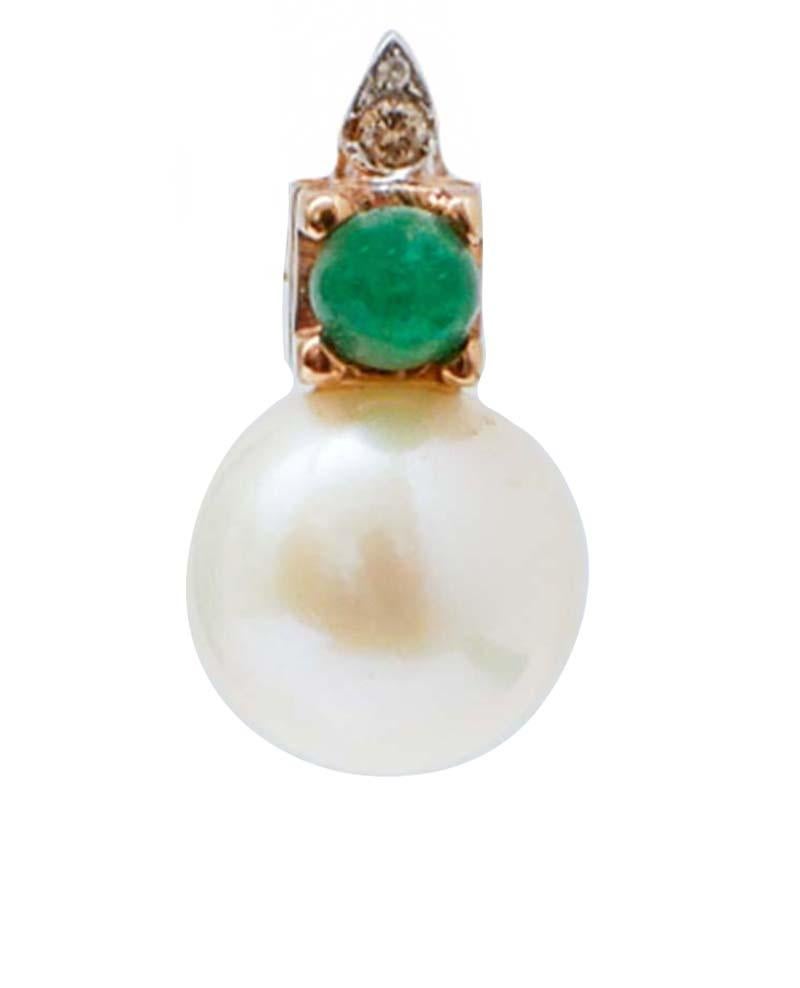 Beautiful earrings in 14 kt rose gold structure mounted with a leaf studded with diamonds and, below, an emerald. As pendant, a pearl.
Diamonds 0.06 ct
Emeralds 0.66 ct
Pearls 3.10 gr
Total Weight 4.70 gr
RF  ++EOF

For any informations, feel free