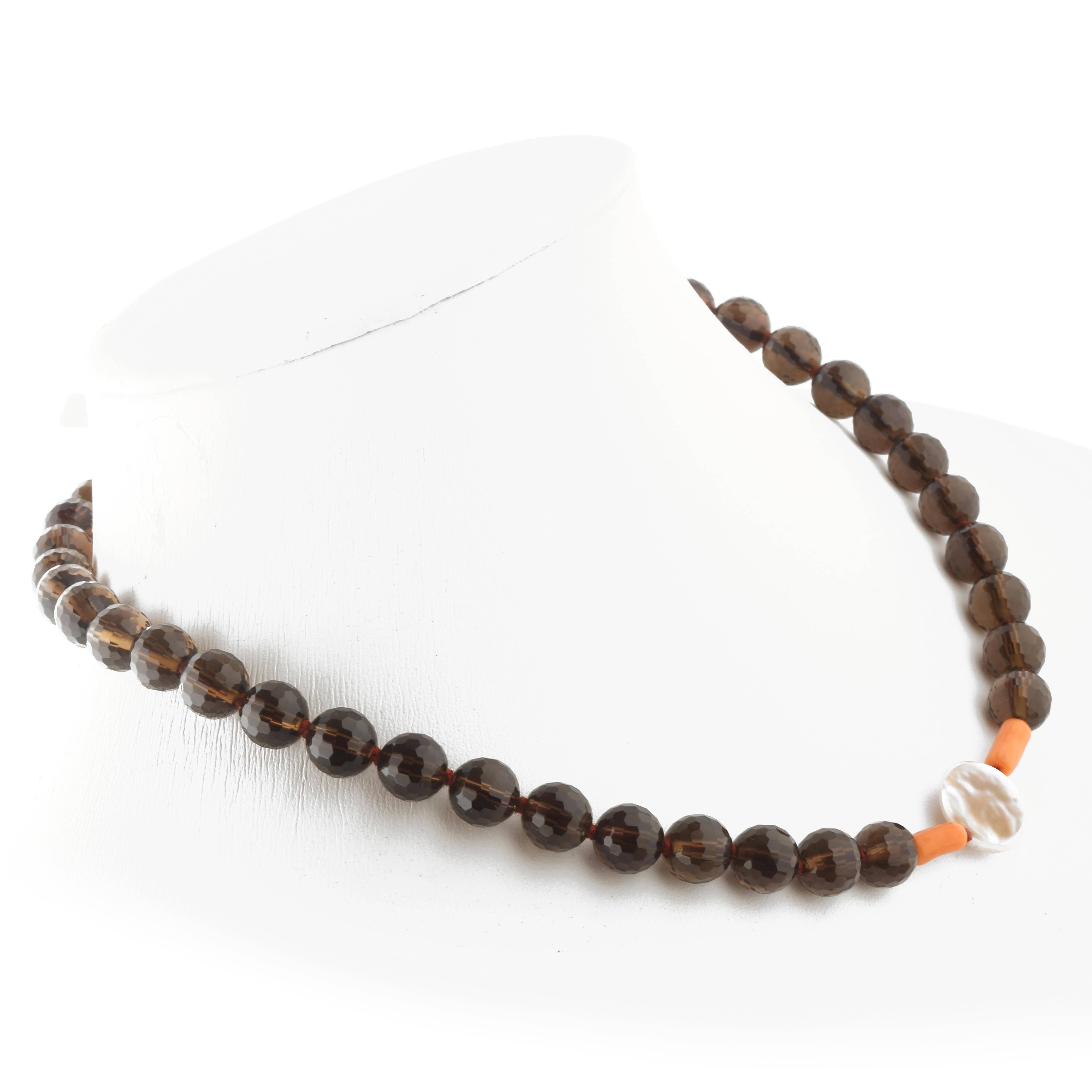 Autumn inspired necklace with beads of natural precious materials. Immerse yourself in the beauty of this uniquely designed necklace with natural stones full of life and color. 

Choker necklace with faceted Smoky Quartz, Natural Coral and a central
