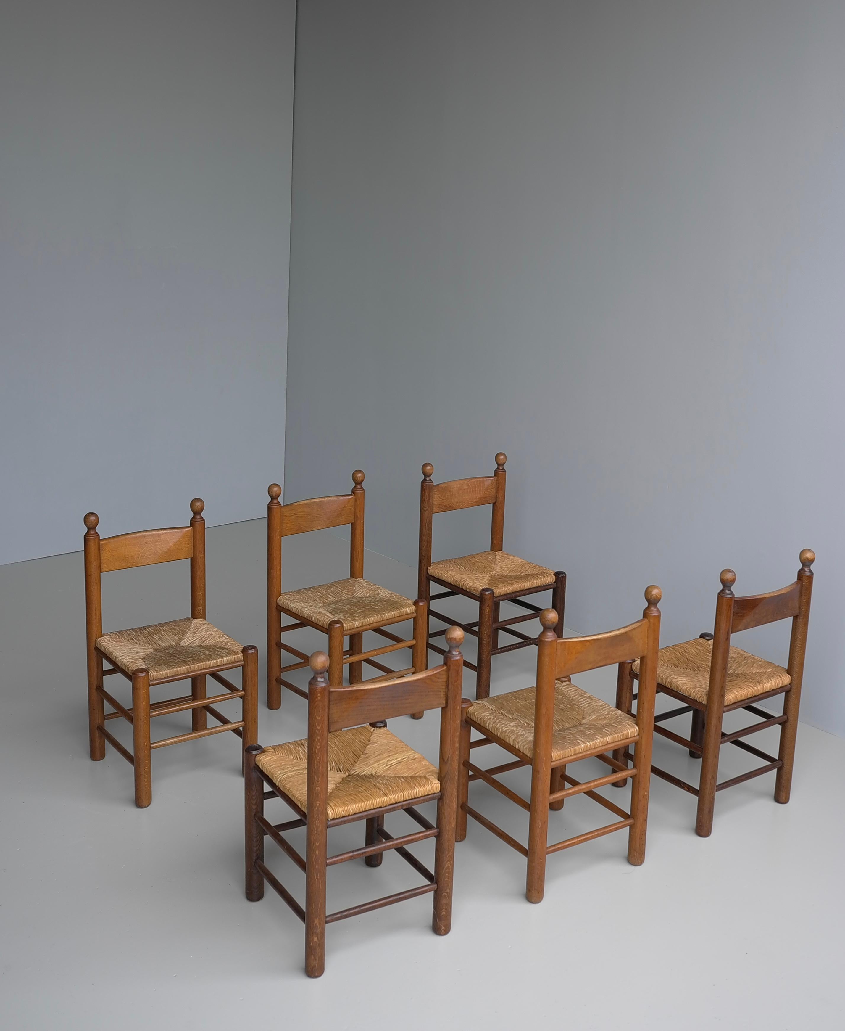 Jonc 12 chaises en chêne et jonc dans le style de Charles Dudouyt, France, années 1960 en vente